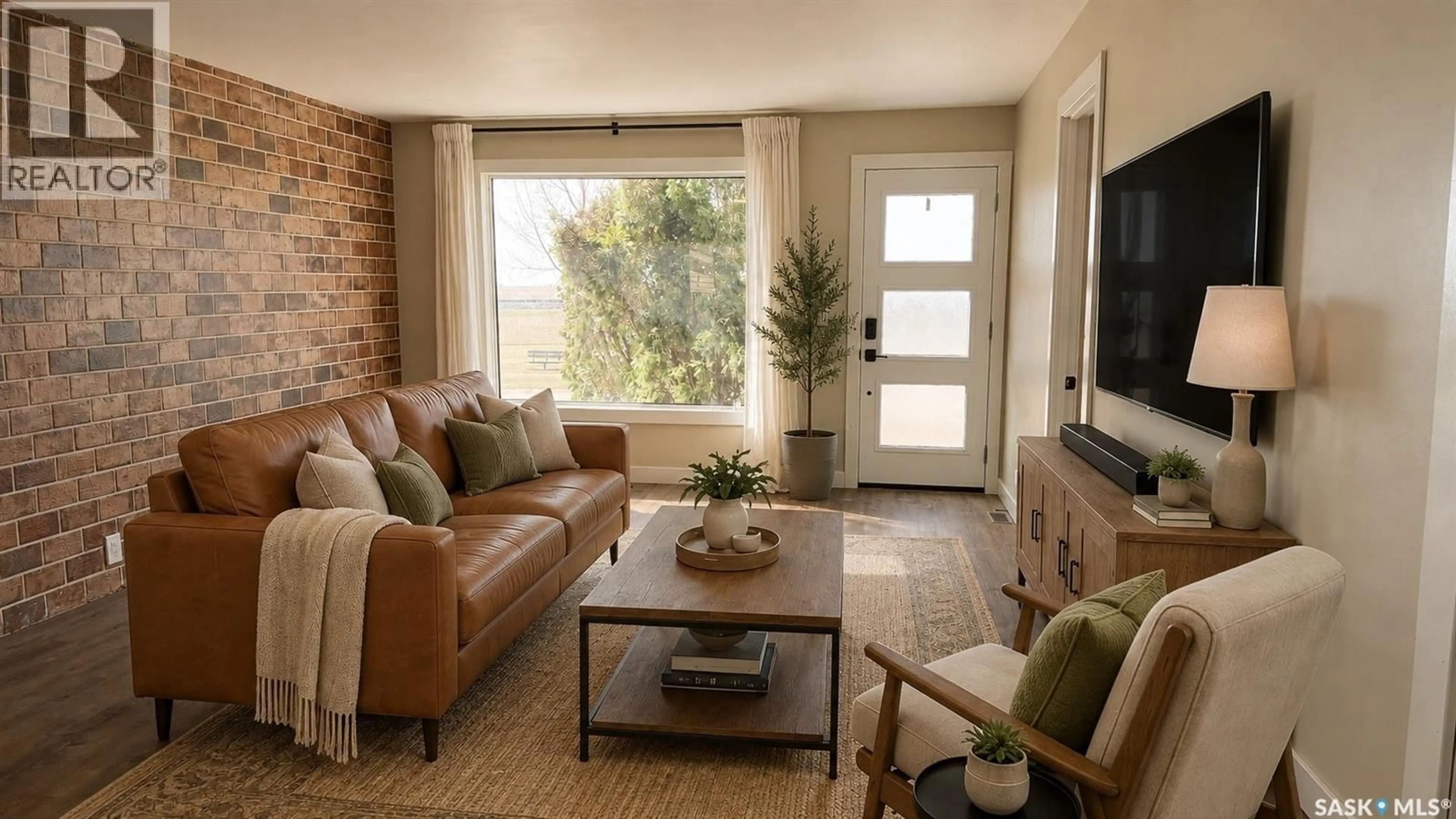 Living room with furniture, unknown for 108 FRONT STREET, Pense Saskatchewan S0G3W0
