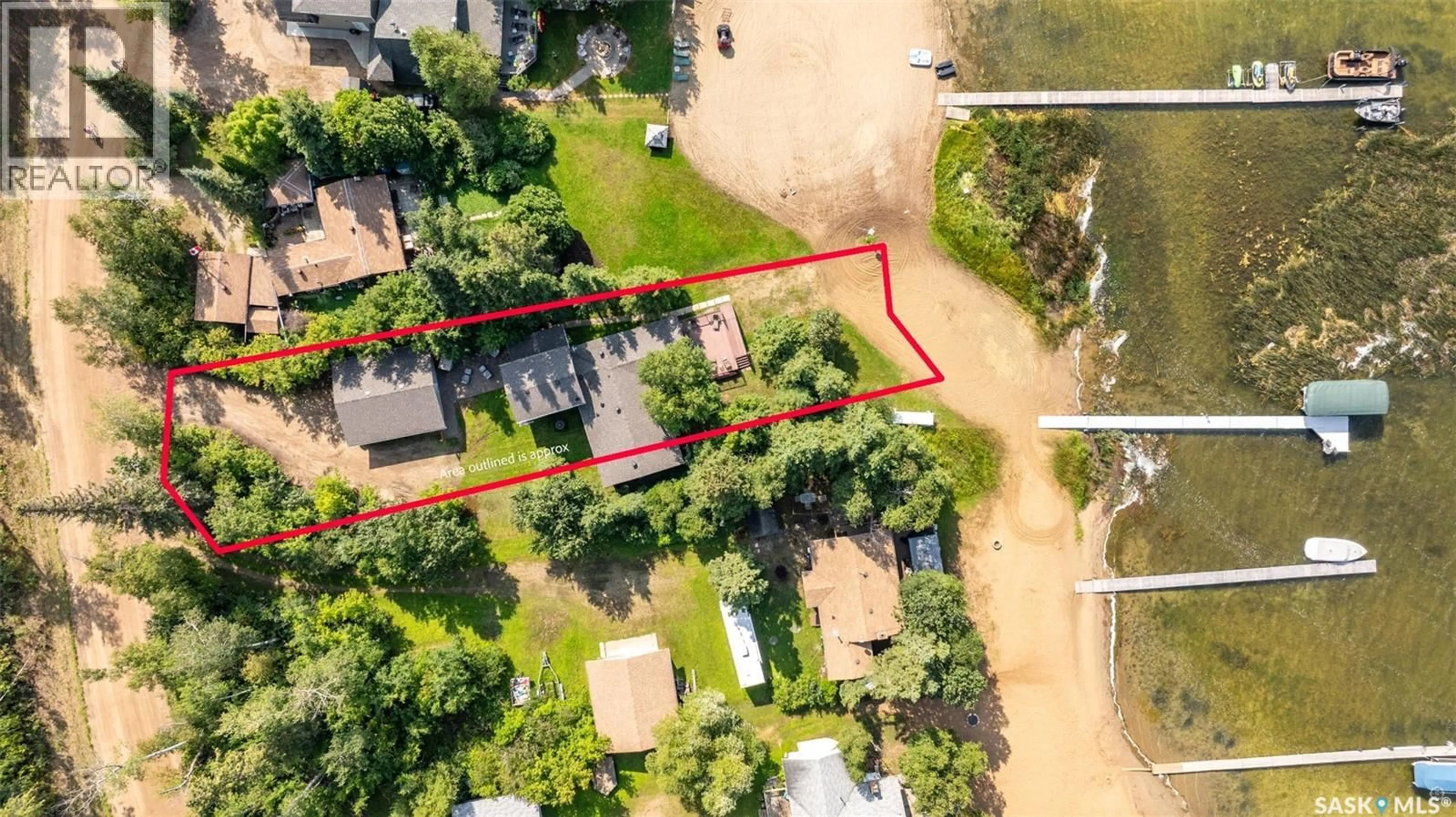 A pic from outside/outdoor area/front of a property/back of a property/a pic from drone, street for 282 NEIS DRIVE, Emma Lake Saskatchewan S0J0N0