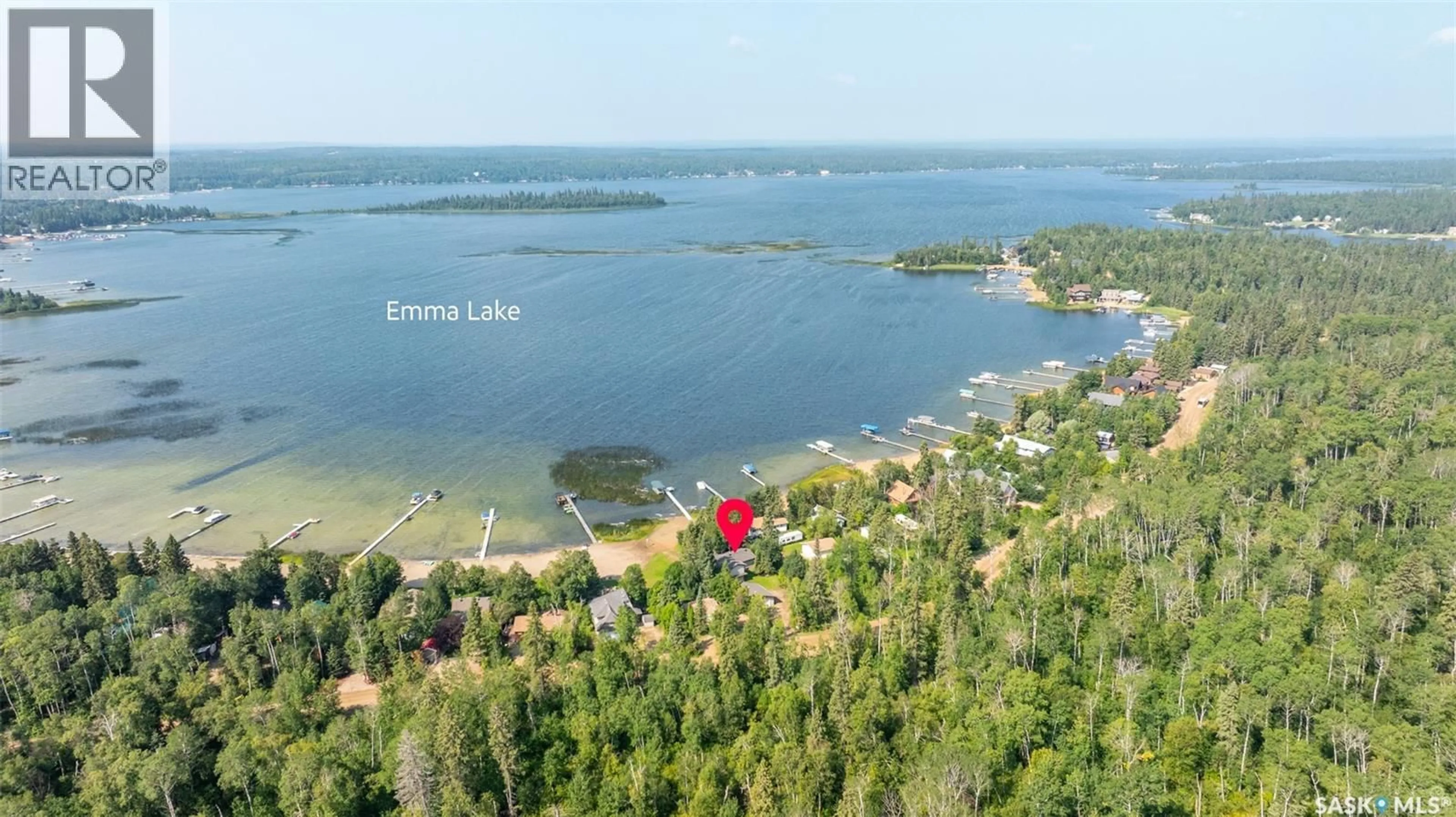 A pic from outside/outdoor area/front of a property/back of a property/a pic from drone, water/lake/river/ocean view for 282 NEIS DRIVE, Emma Lake Saskatchewan S0J0N0