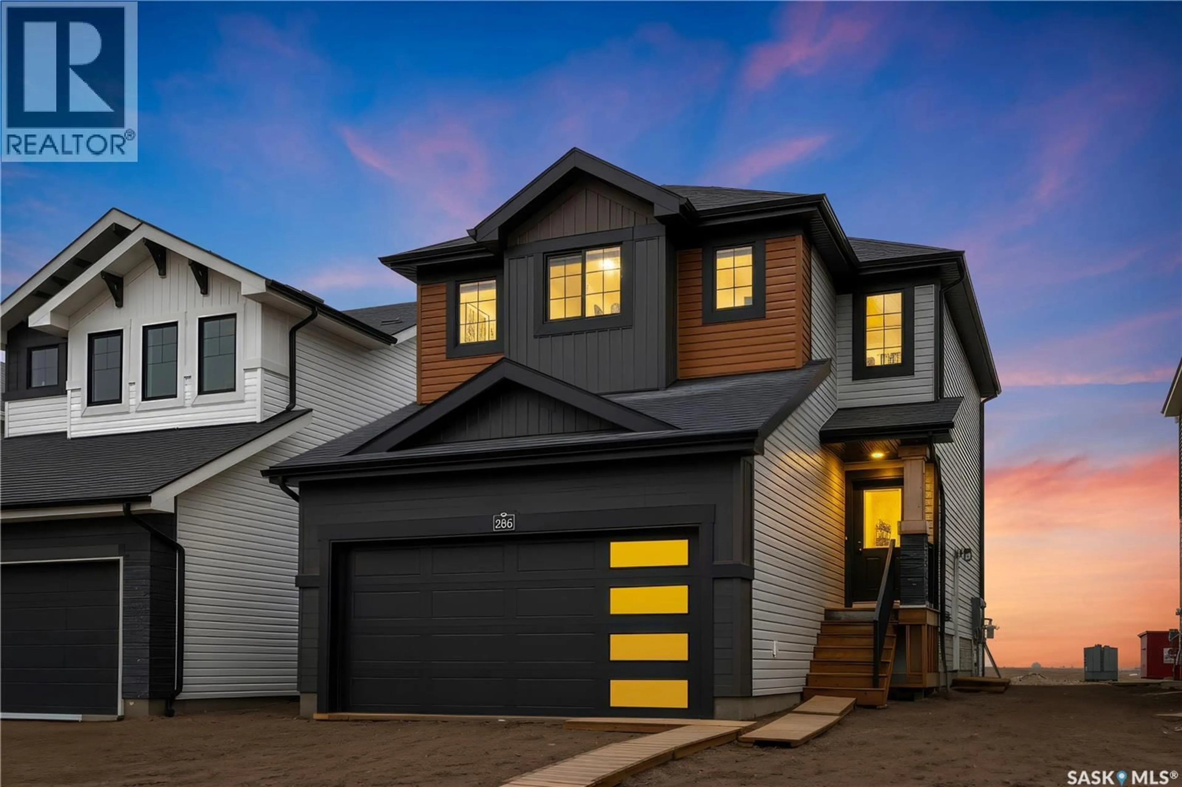 Home with vinyl exterior material, street for 286 FROESE CRESCENT, Warman Saskatchewan S0K4S3