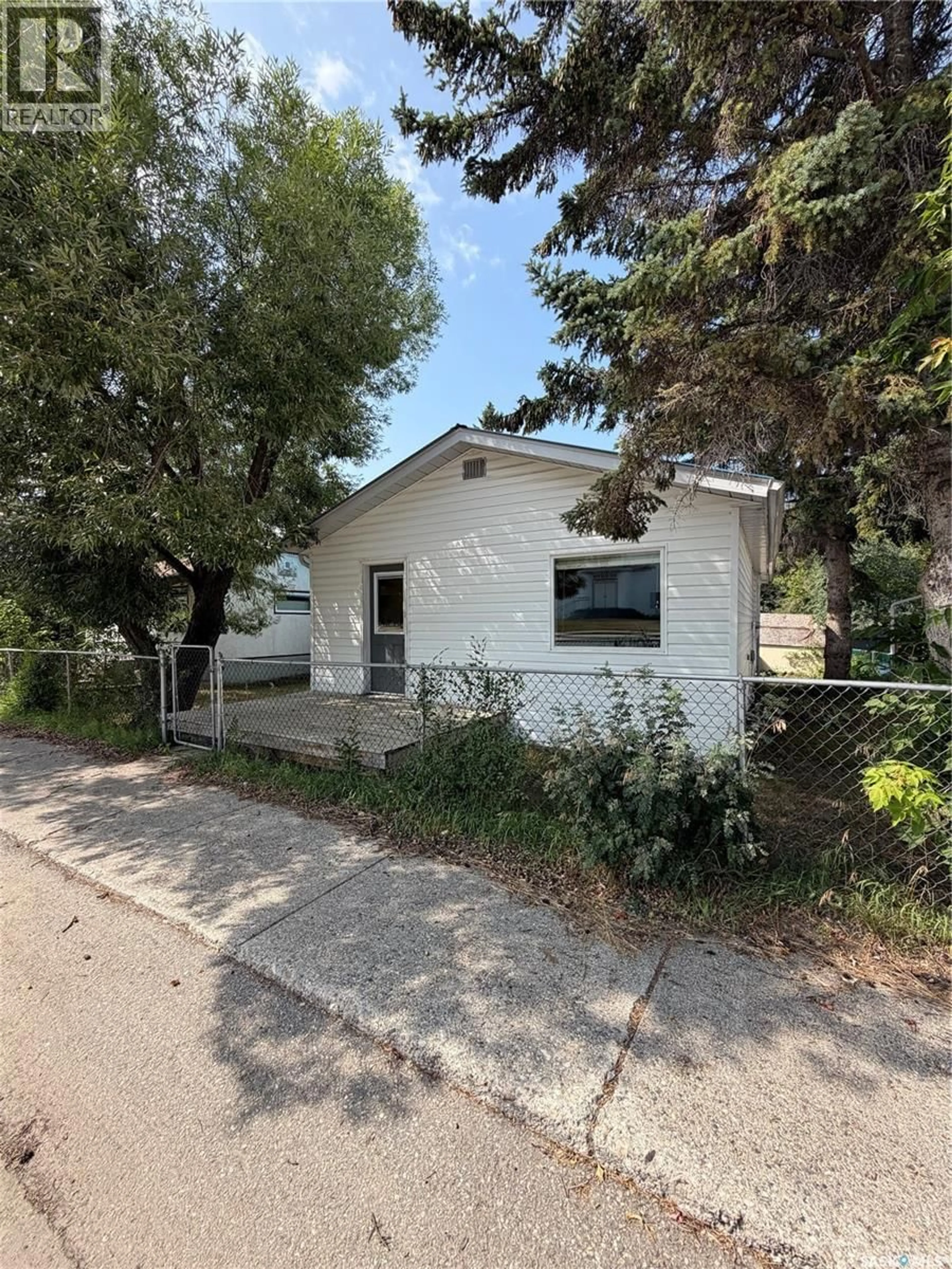 Home with vinyl exterior material, street for 537 CHURCHILL STREET, Hudson Bay Saskatchewan S0E0Y0