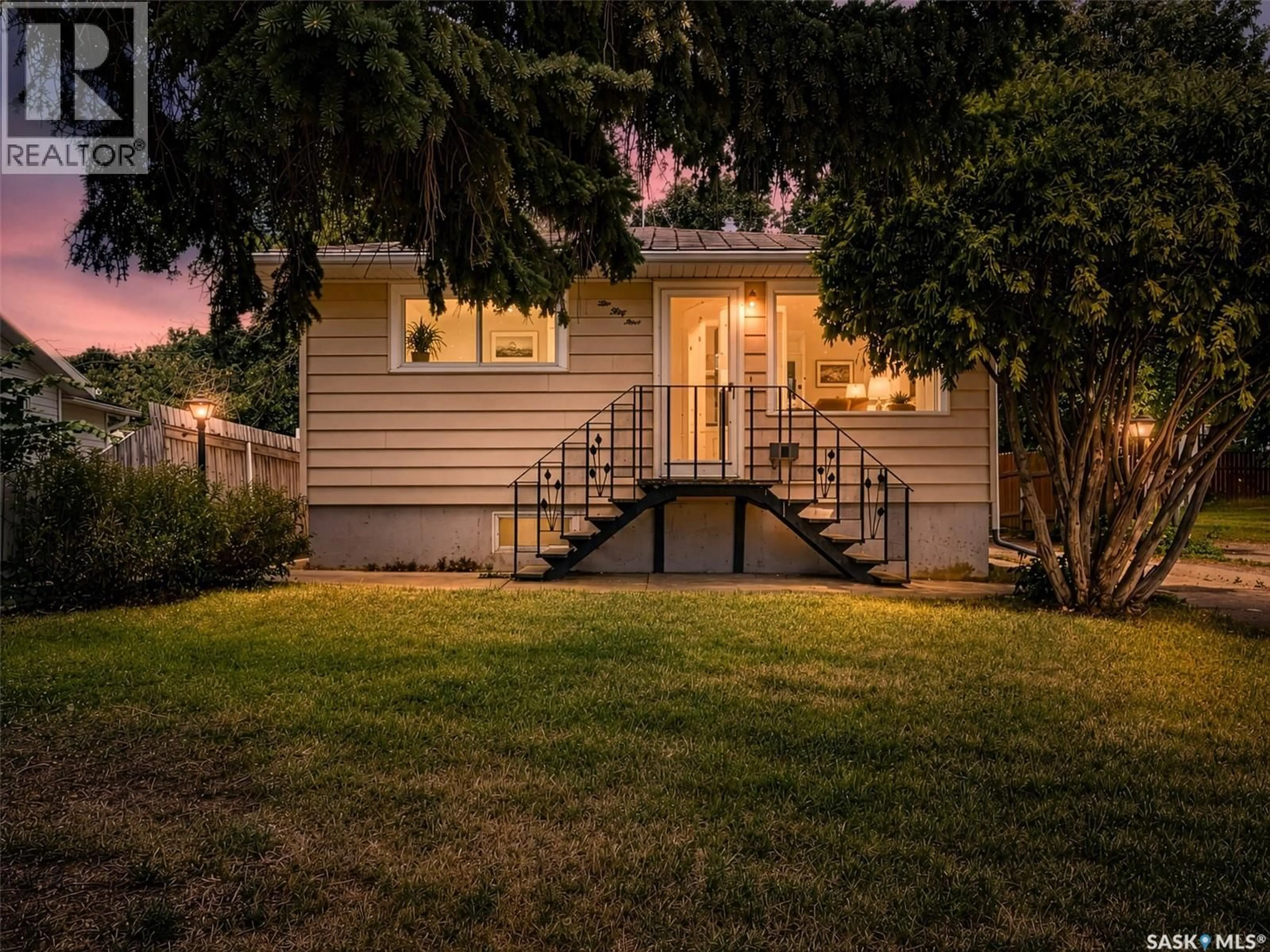Home with vinyl exterior material, street for 1054 STADACONA STREET, Moose Jaw Saskatchewan S6H2B2