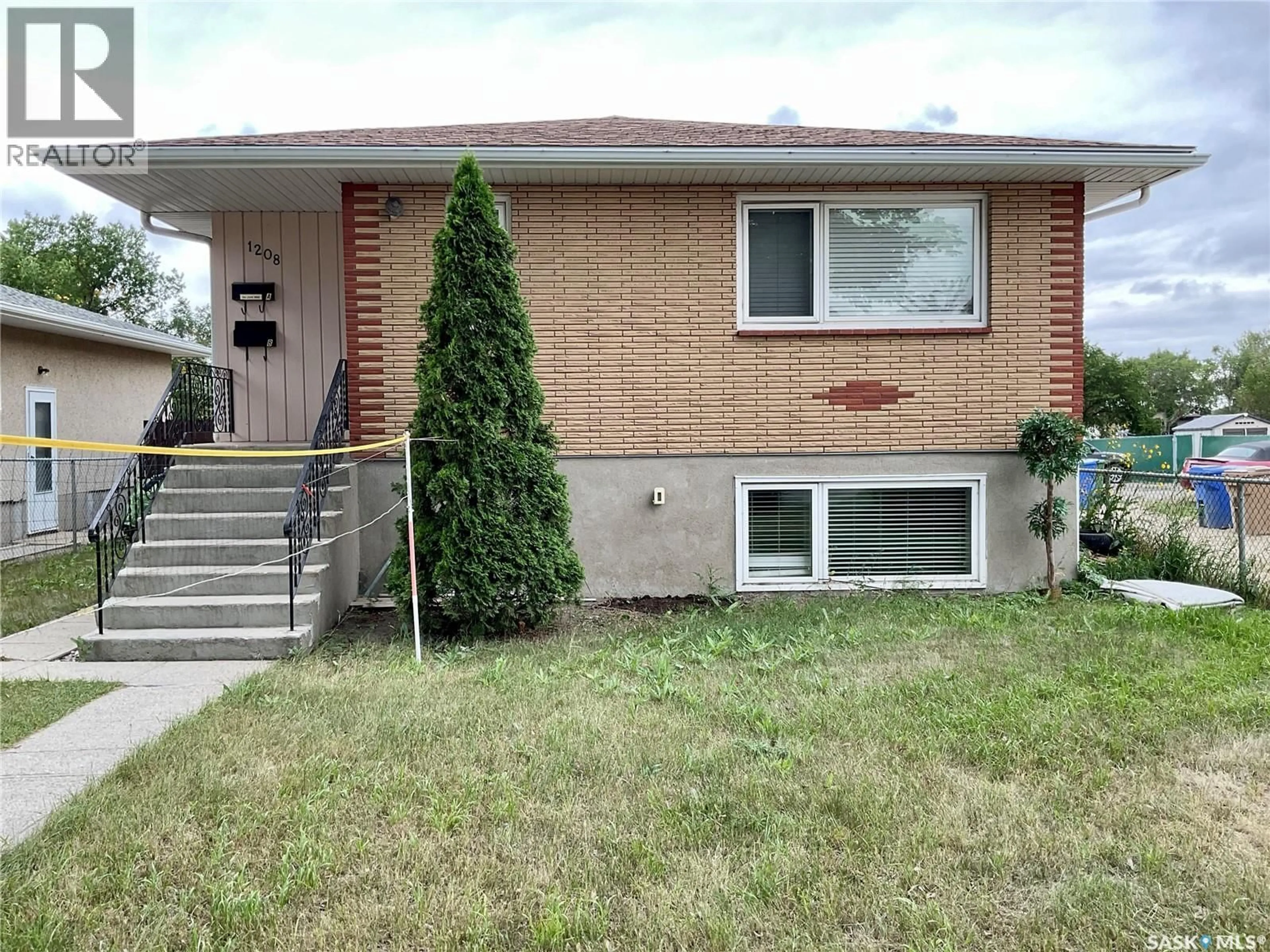 Home with vinyl exterior material, street for 1208 BOND STREET, Regina Saskatchewan S4N1W9