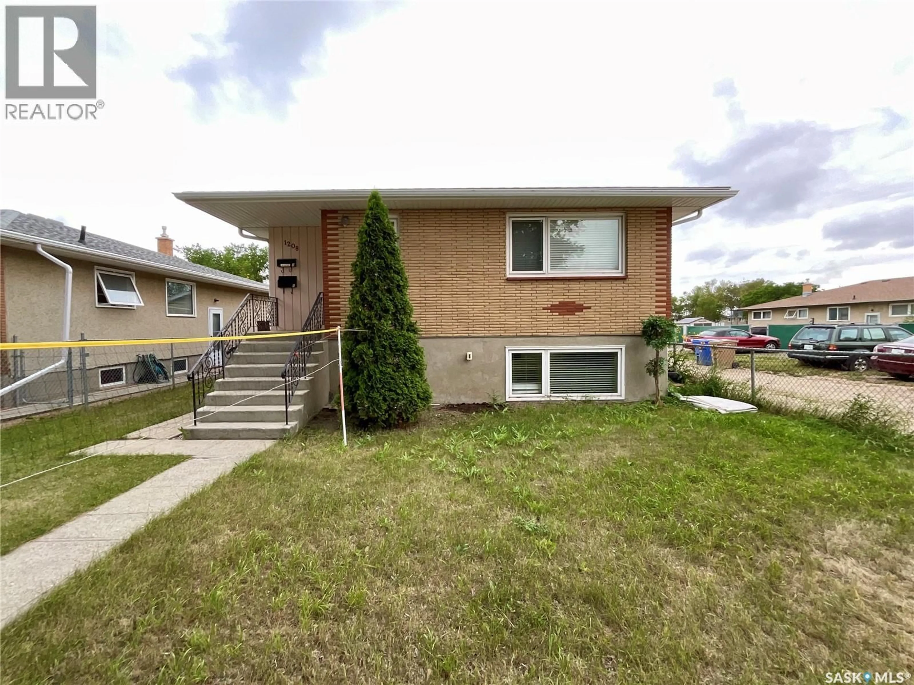 Home with vinyl exterior material, street for 1208 BOND STREET, Regina Saskatchewan S4N1W9