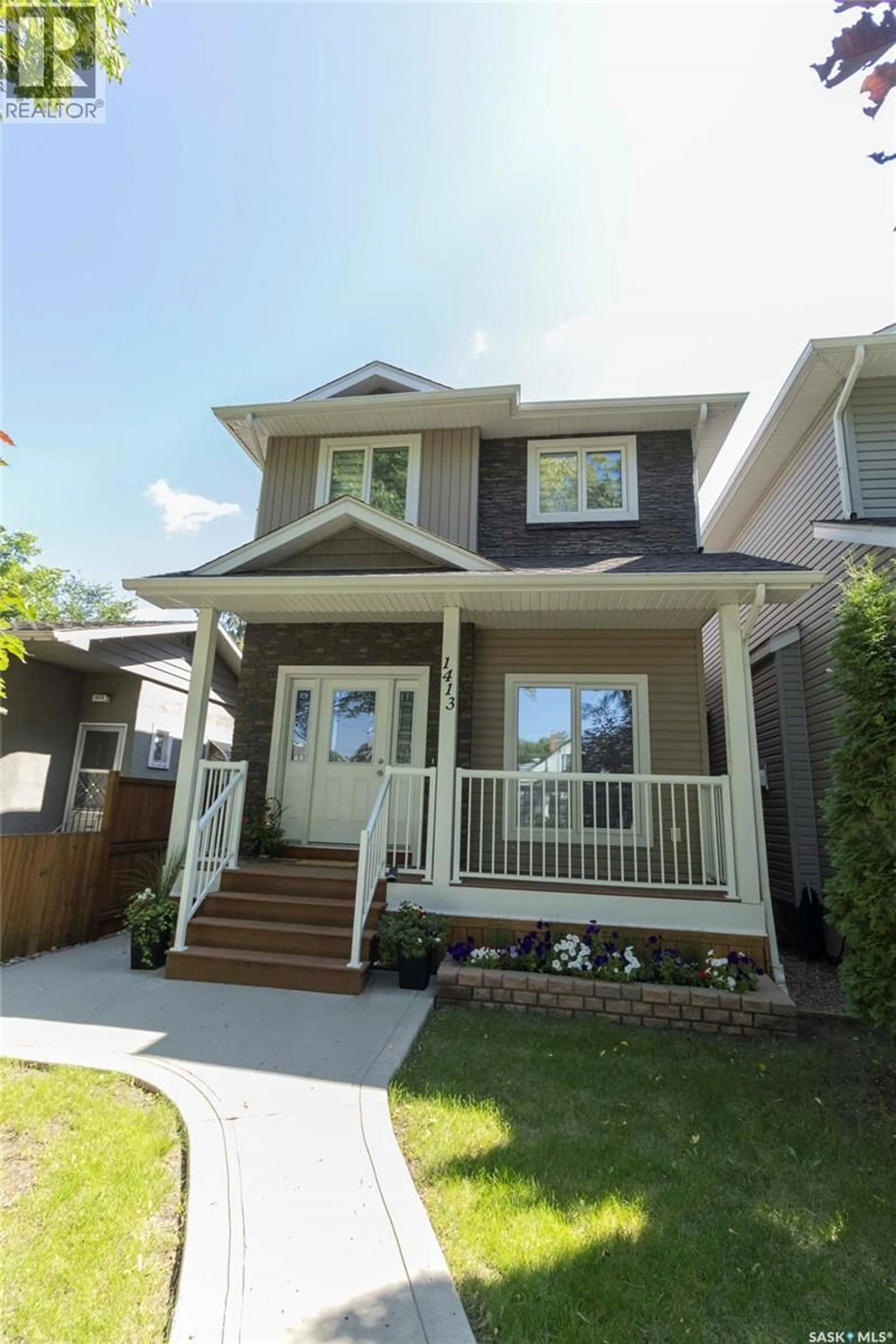 Home with vinyl exterior material, street for 1413 CAIRNS AVENUE, Saskatoon Saskatchewan S7H2H3