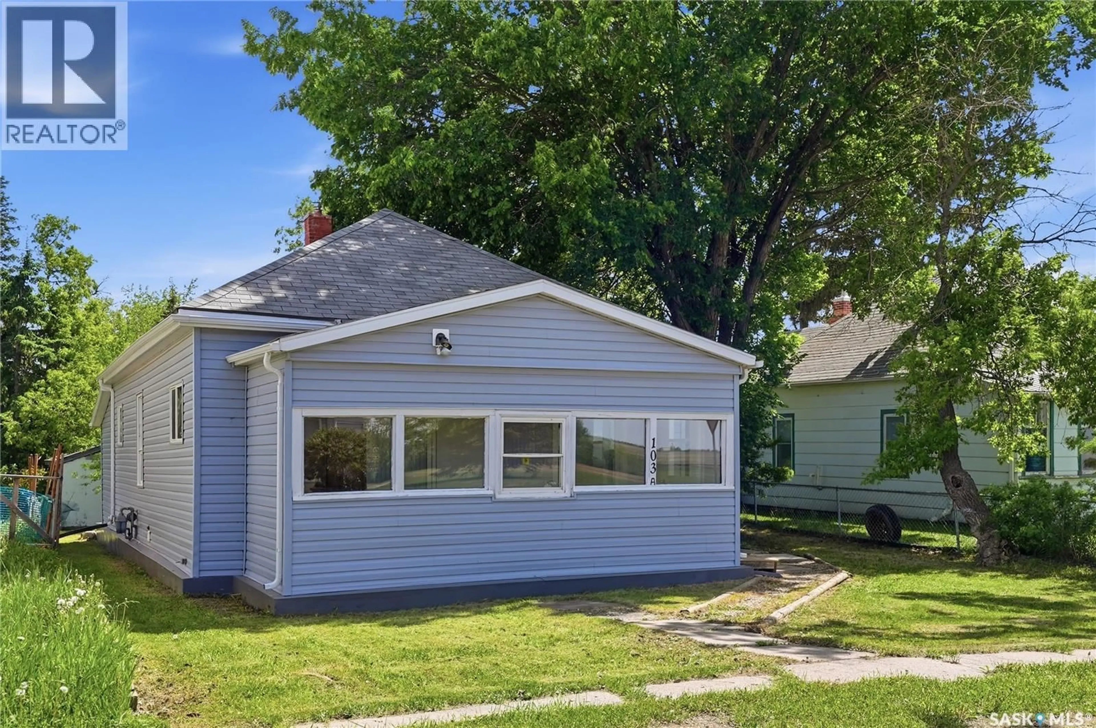 Home with vinyl exterior material, street for 103A NORMAN AVENUE, Aberdeen Saskatchewan S0K0A0
