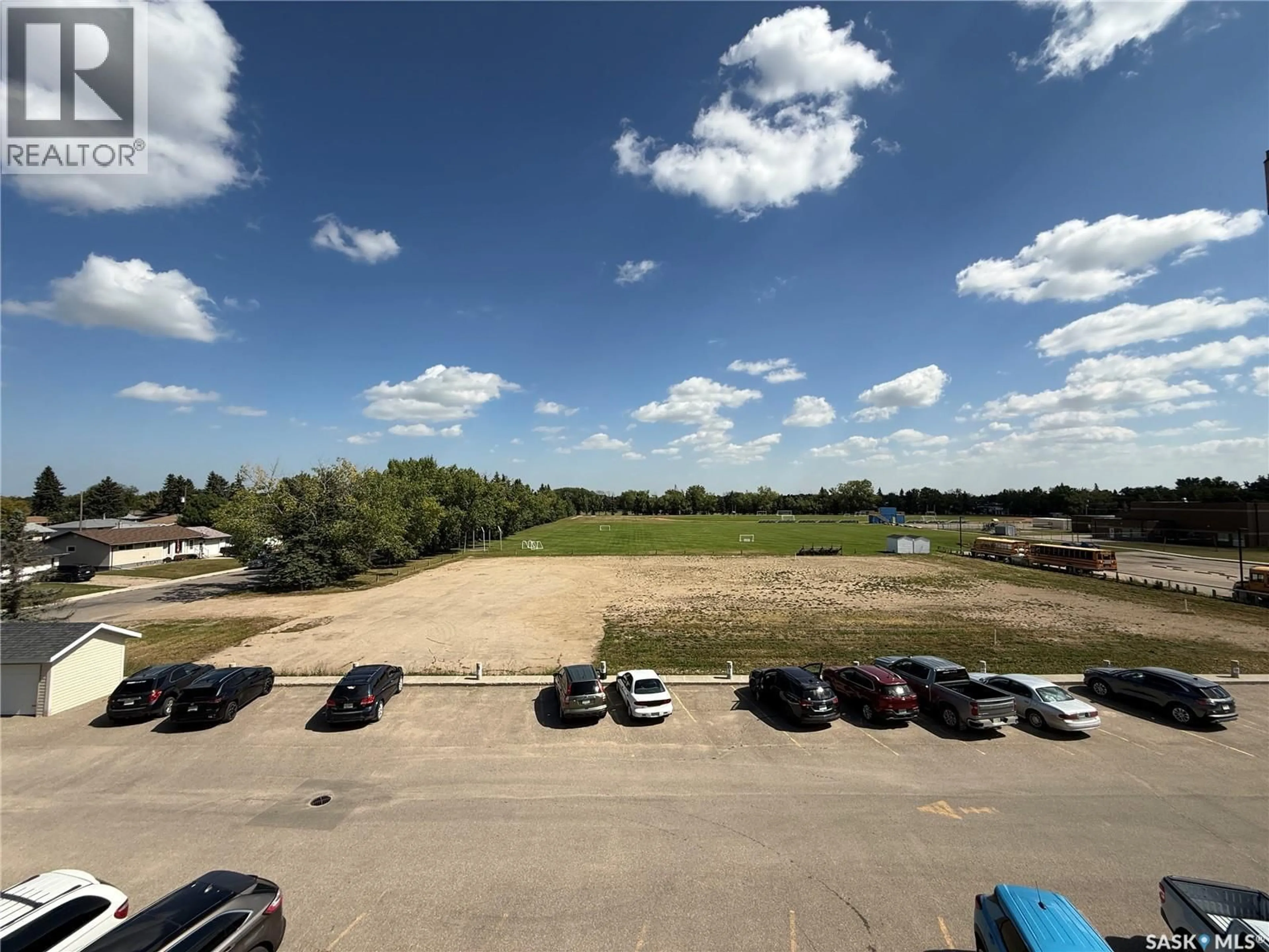 A pic from outside/outdoor area/front of a property/back of a property/a pic from drone, unknown for 910 - 322 MAIN STREET, Humboldt Saskatchewan S0K2A0