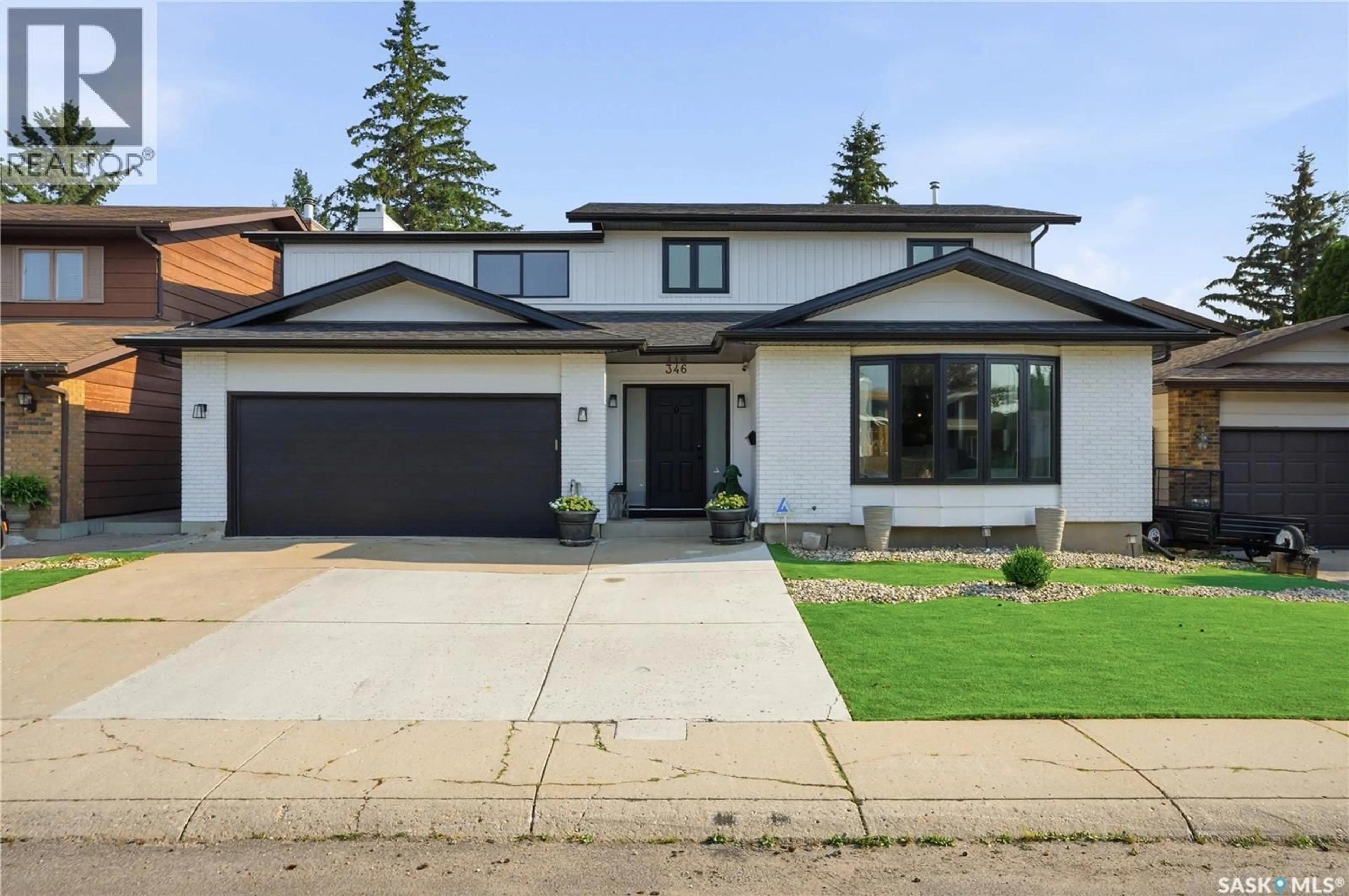Home with brick exterior material, street for 346 WAKAW CRESCENT, Saskatoon Saskatchewan S7J4E2