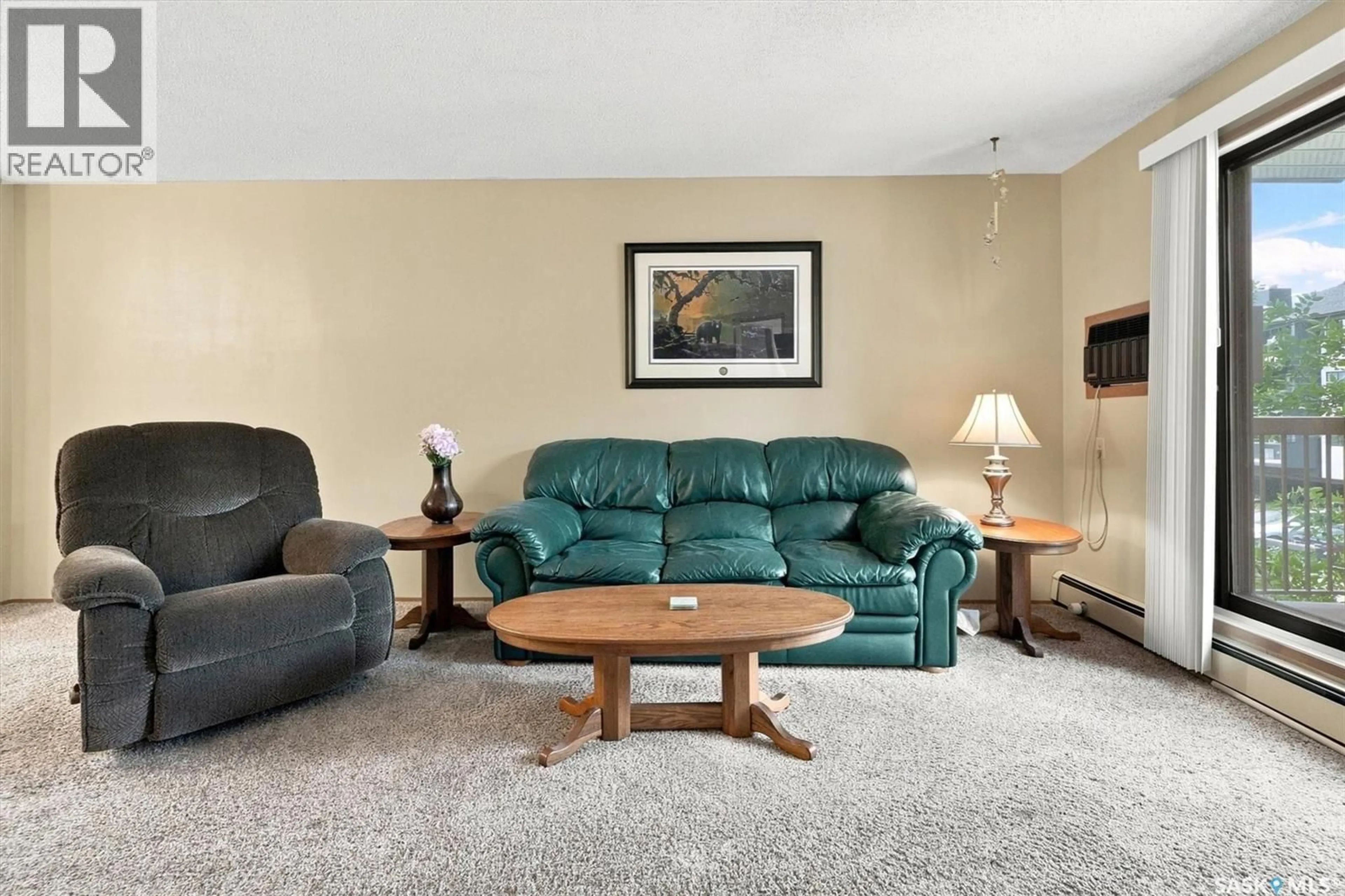 Living room with furniture, carpet floor for 203 - 525 5TH AVENUE, Saskatoon Saskatchewan S7K2R1