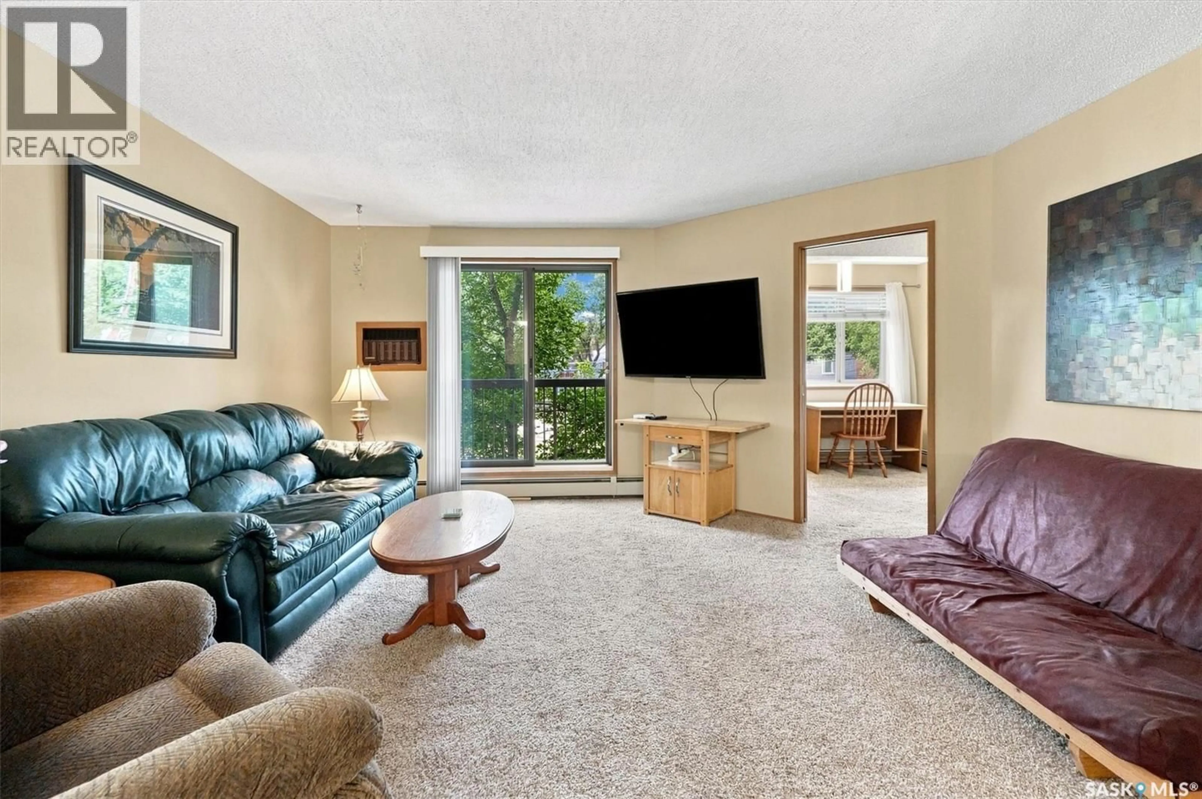 Living room with furniture, carpet floor for 203 - 525 5TH AVENUE, Saskatoon Saskatchewan S7K2R1