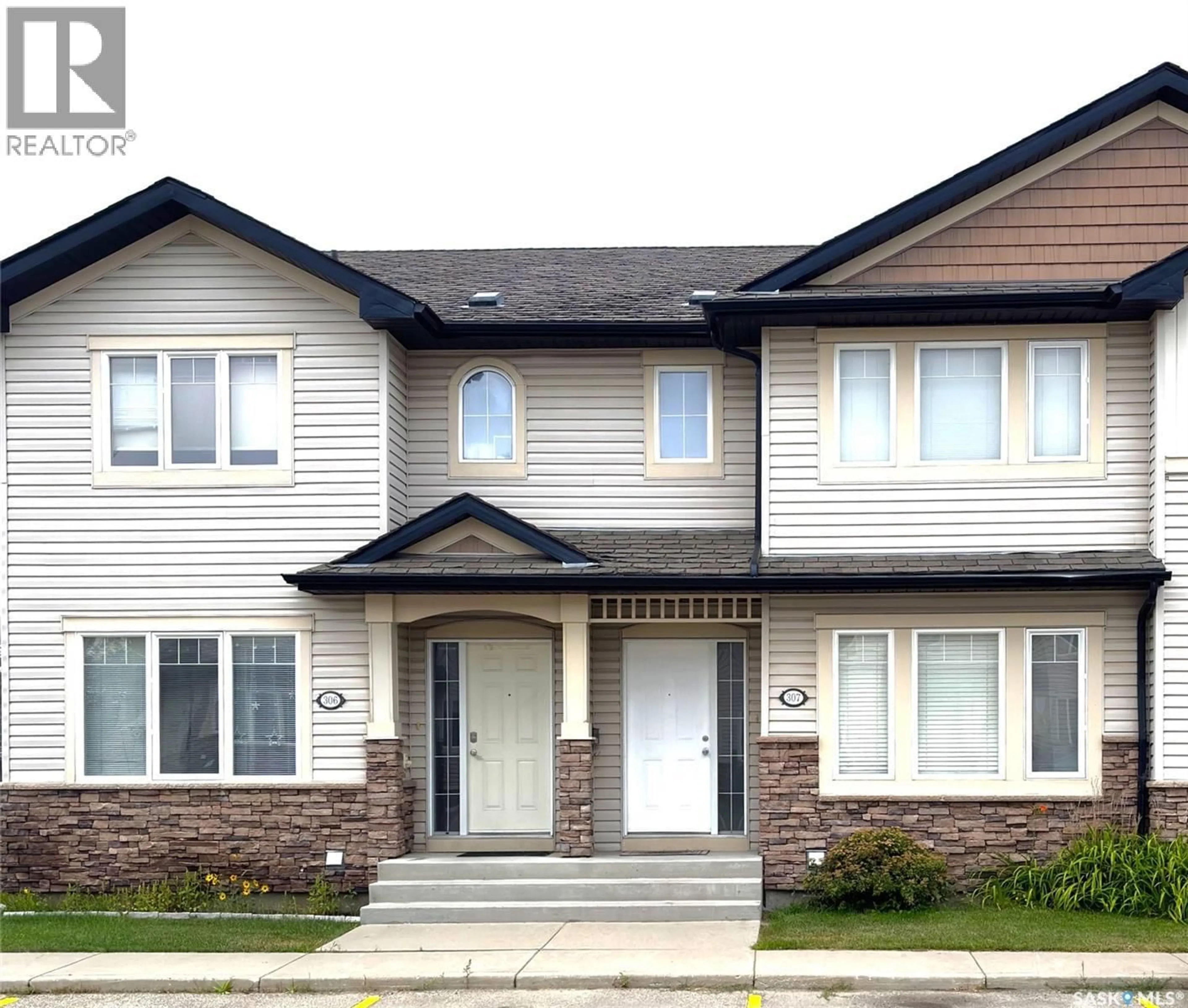 Home with vinyl exterior material, street for 415 - 307 LYND CRESCENT, Saskatoon Saskatchewan S7T0C2