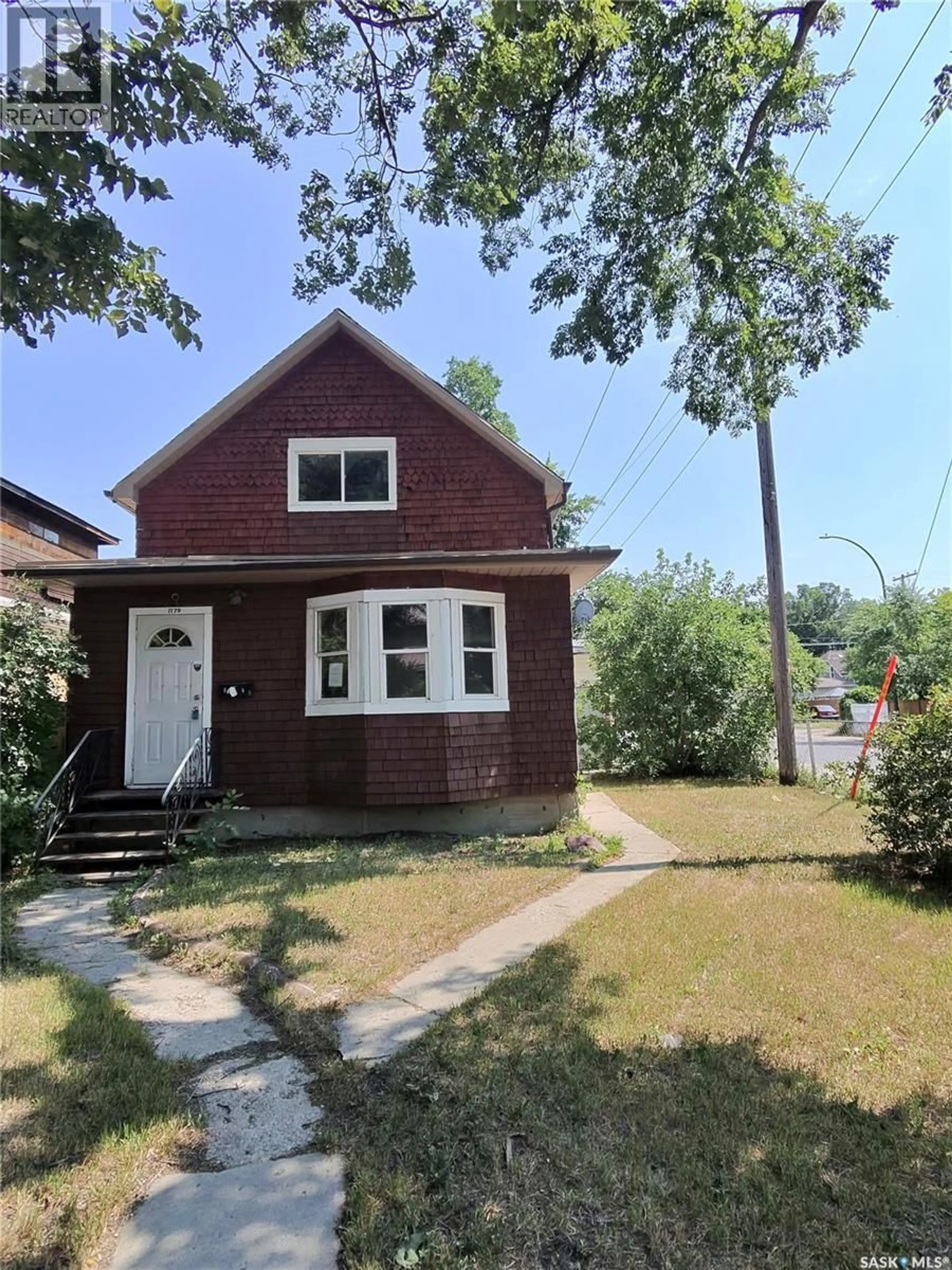 Home with brick exterior material, street for 1179 RETALLACK STREET, Regina Saskatchewan S4T2H6