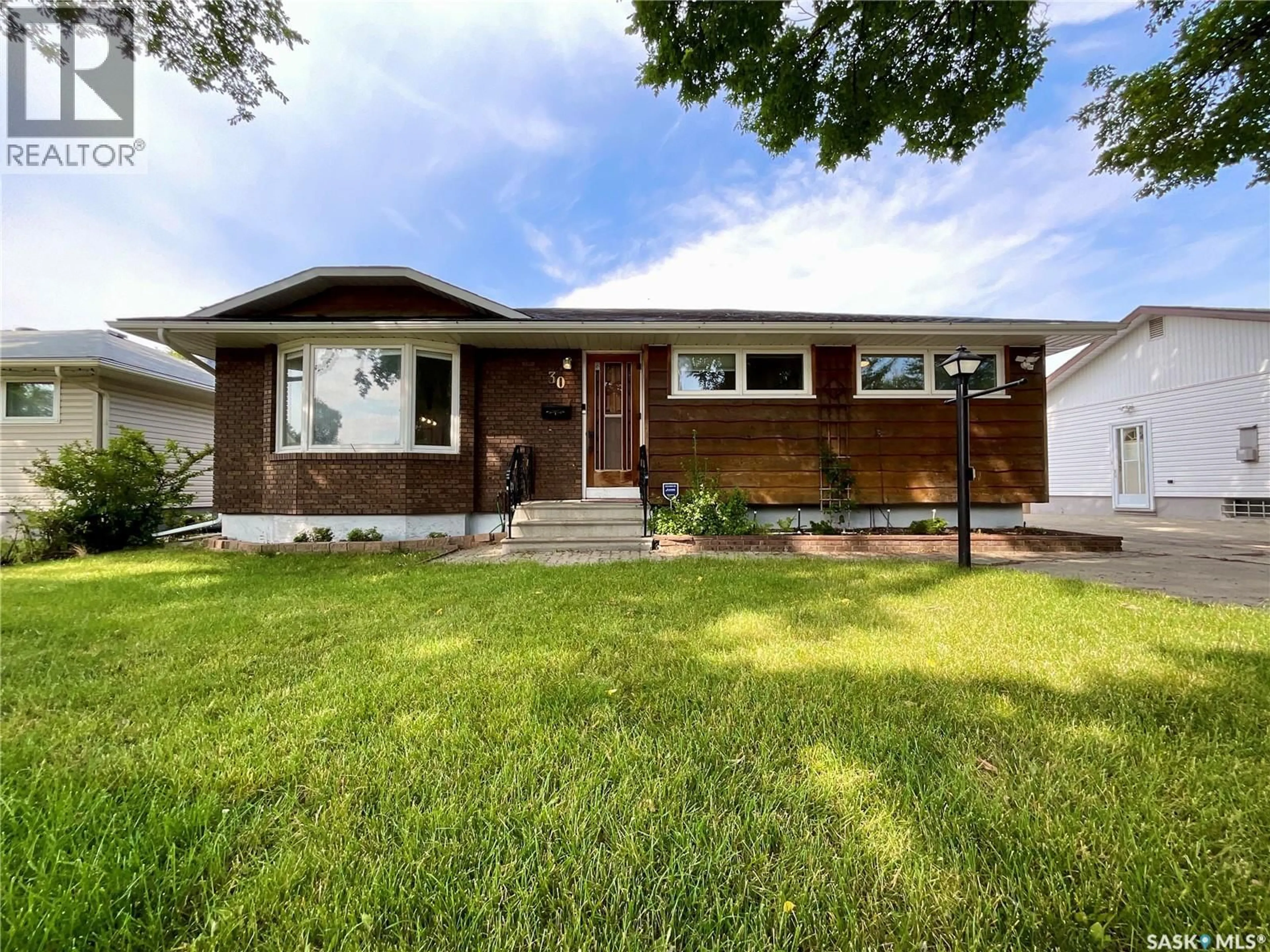 Home with vinyl exterior material, street for 30 PROBE STREET, Regina Saskatchewan S4R4V1