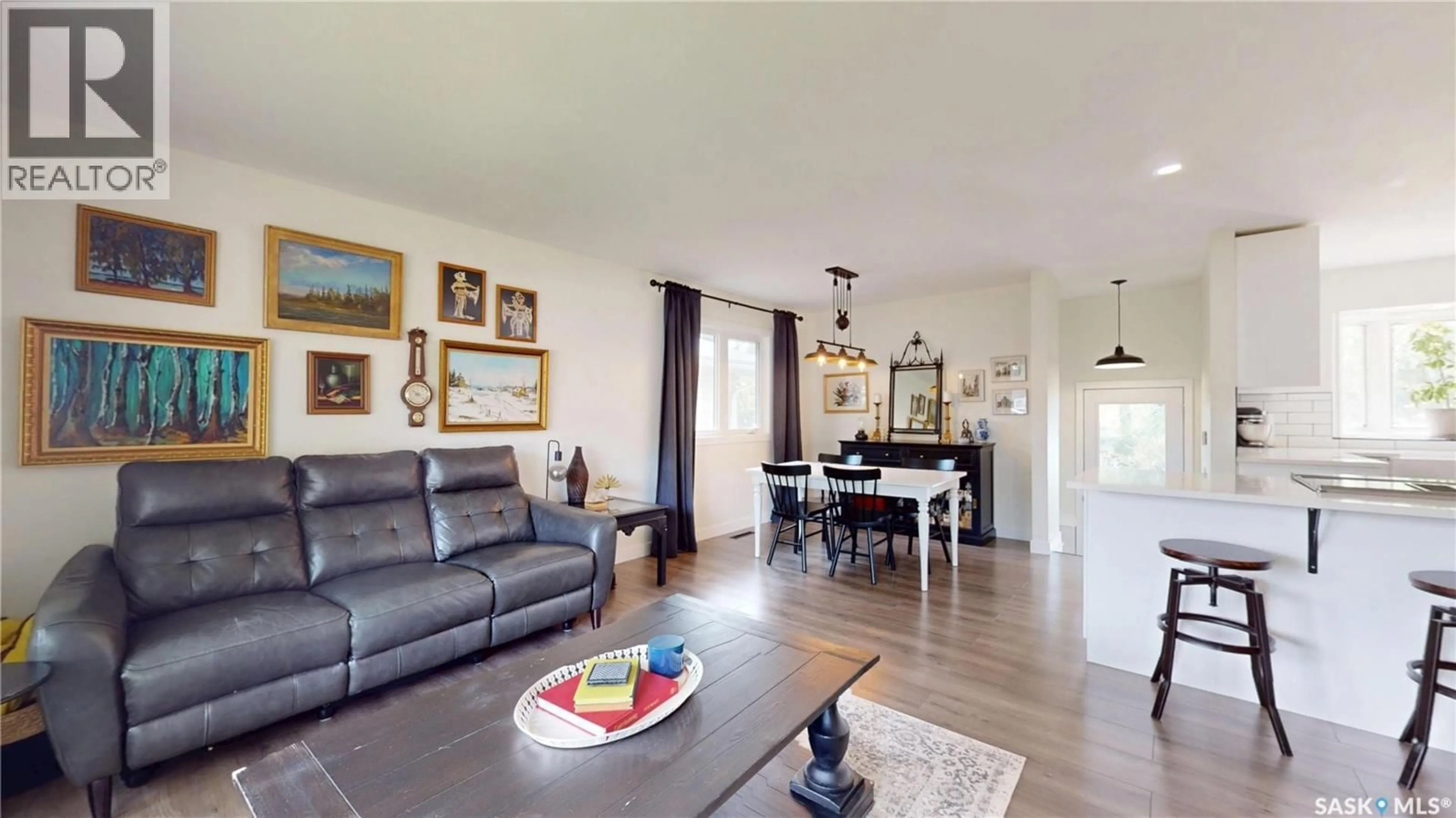 Living room with furniture, wood/laminate floor for 30 PROBE STREET, Regina Saskatchewan S4R4V1