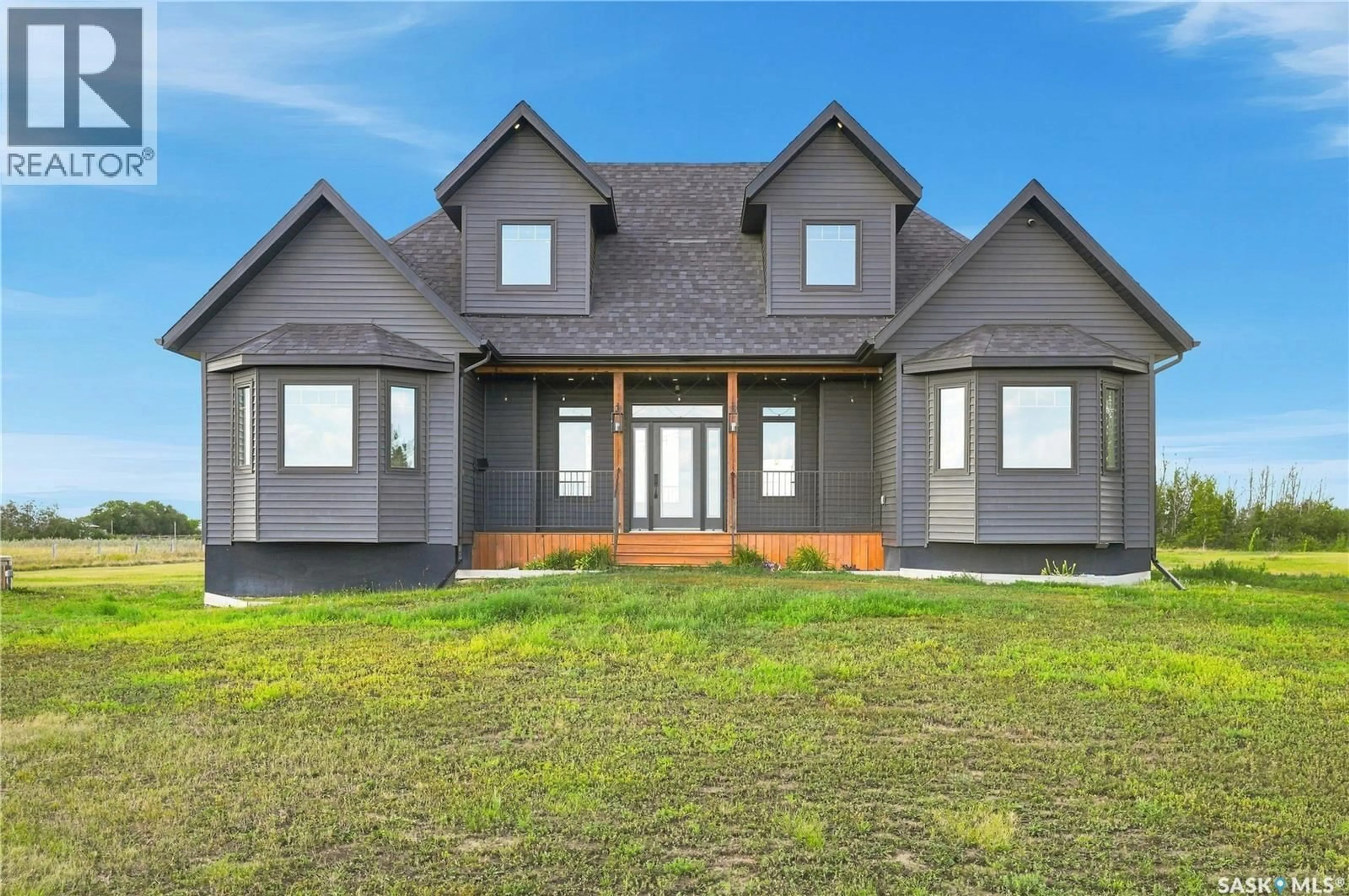 Home with brick exterior material, unknown for WIWCHAR ACREAGE, Vanscoy Rm No. 345 Saskatchewan S0L2L0