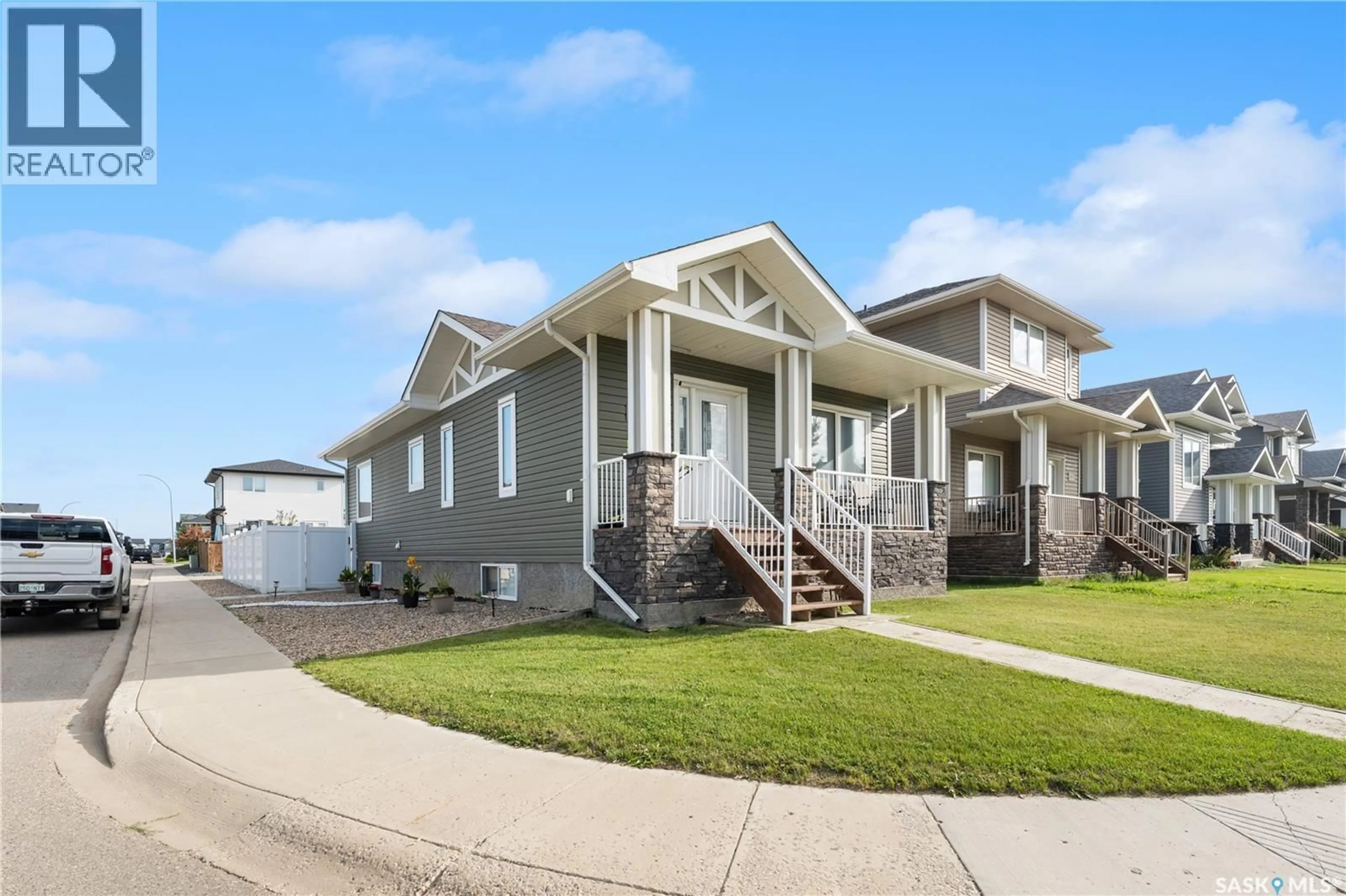 Home with vinyl exterior material, street for 1051 PARR HILL DRIVE, Martensville Saskatchewan S0K2T1