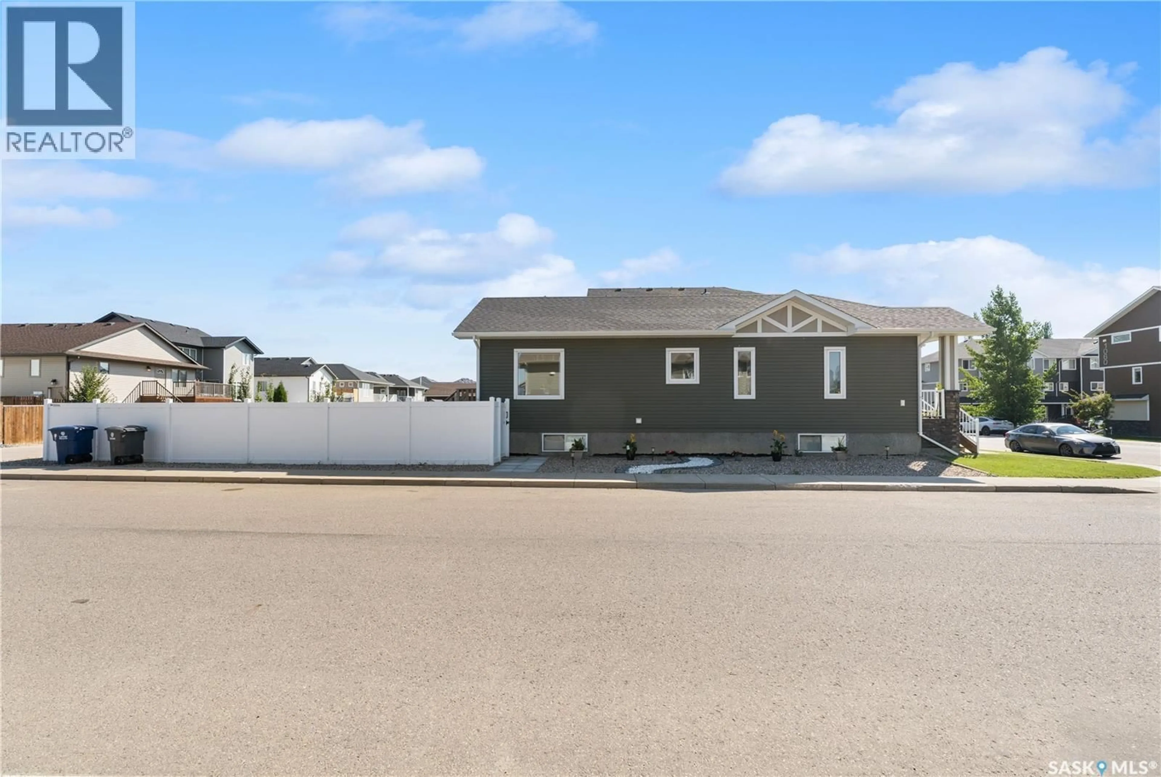 Home with vinyl exterior material, street for 1051 PARR HILL DRIVE, Martensville Saskatchewan S0K2T1