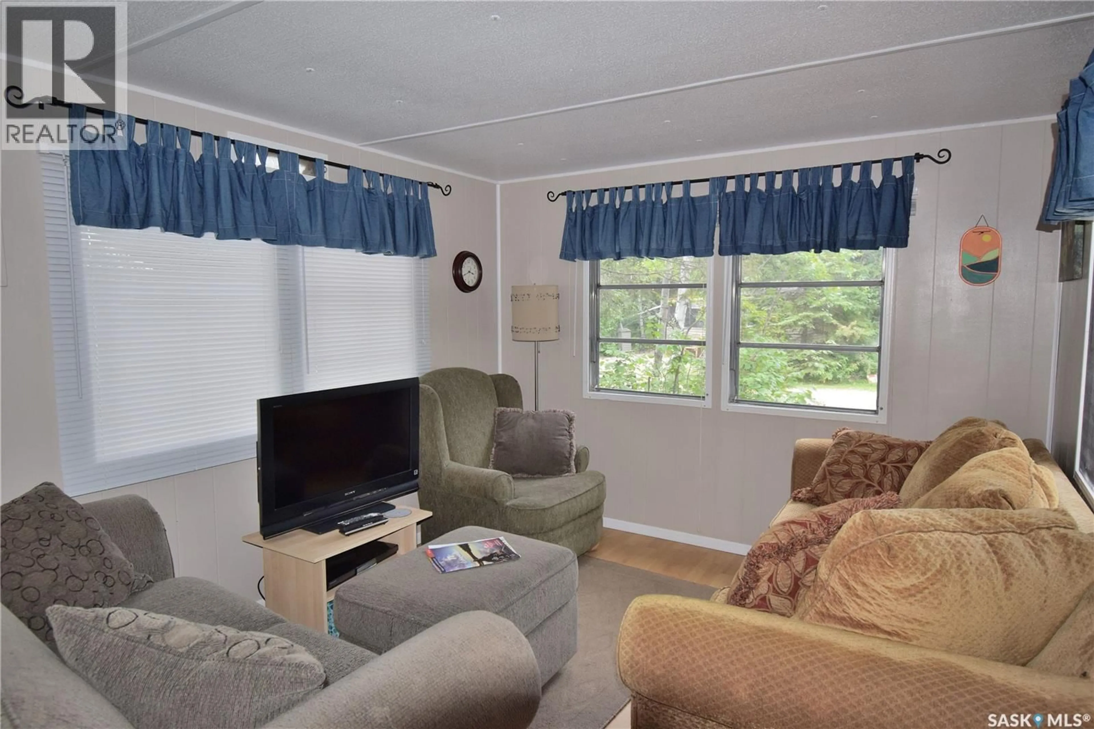 Living room with furniture, unknown for 106 DUSTY TRAIL, Emma Lake Saskatchewan S0J0N0