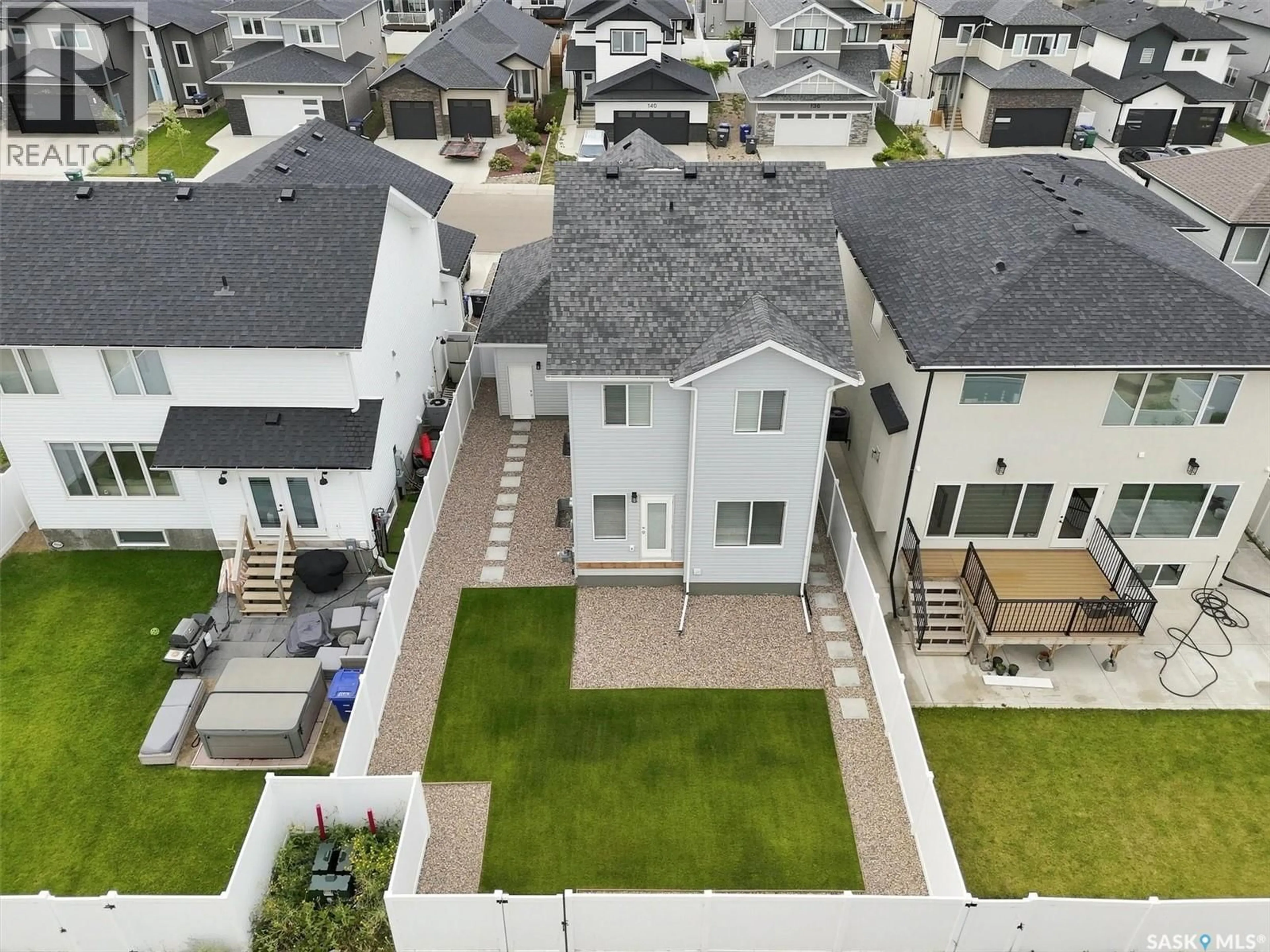 A pic from outside/outdoor area/front of a property/back of a property/a pic from drone, street for 143 BARRETT STREET, Saskatoon Saskatchewan S7W0Z8