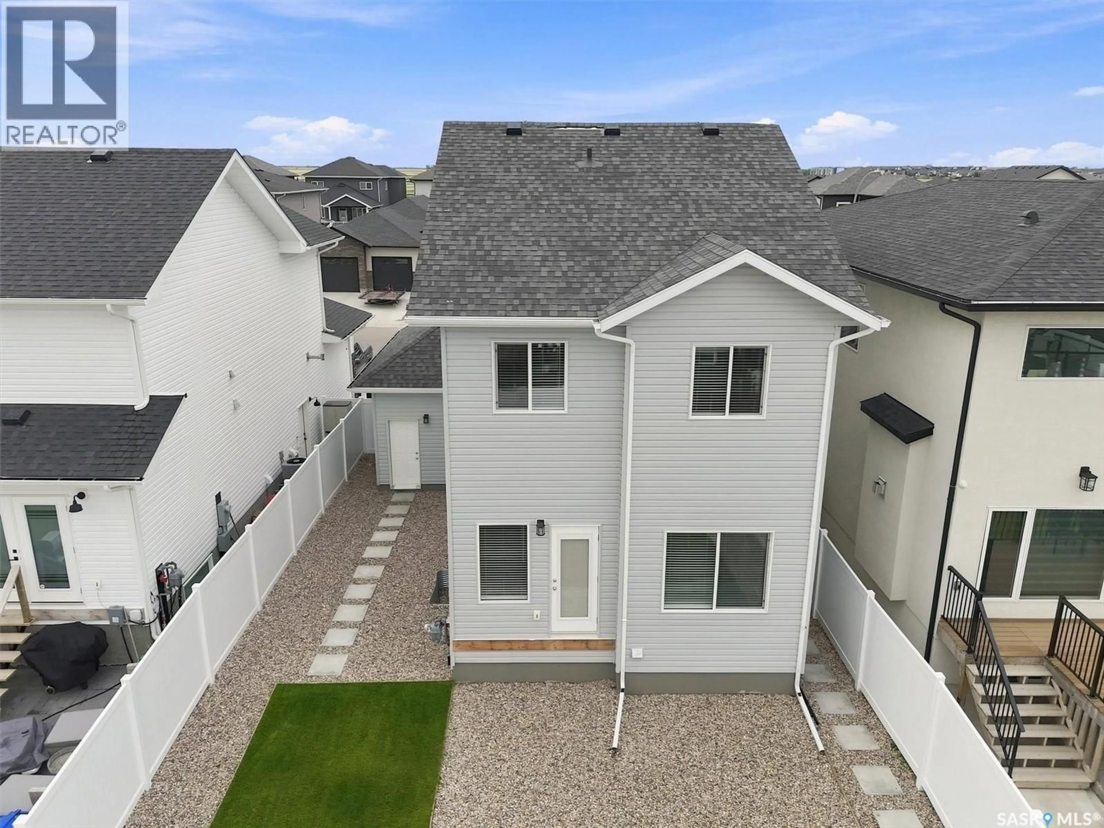 A pic from outside/outdoor area/front of a property/back of a property/a pic from drone, unknown for 143 BARRETT STREET, Saskatoon Saskatchewan S7W0Z8