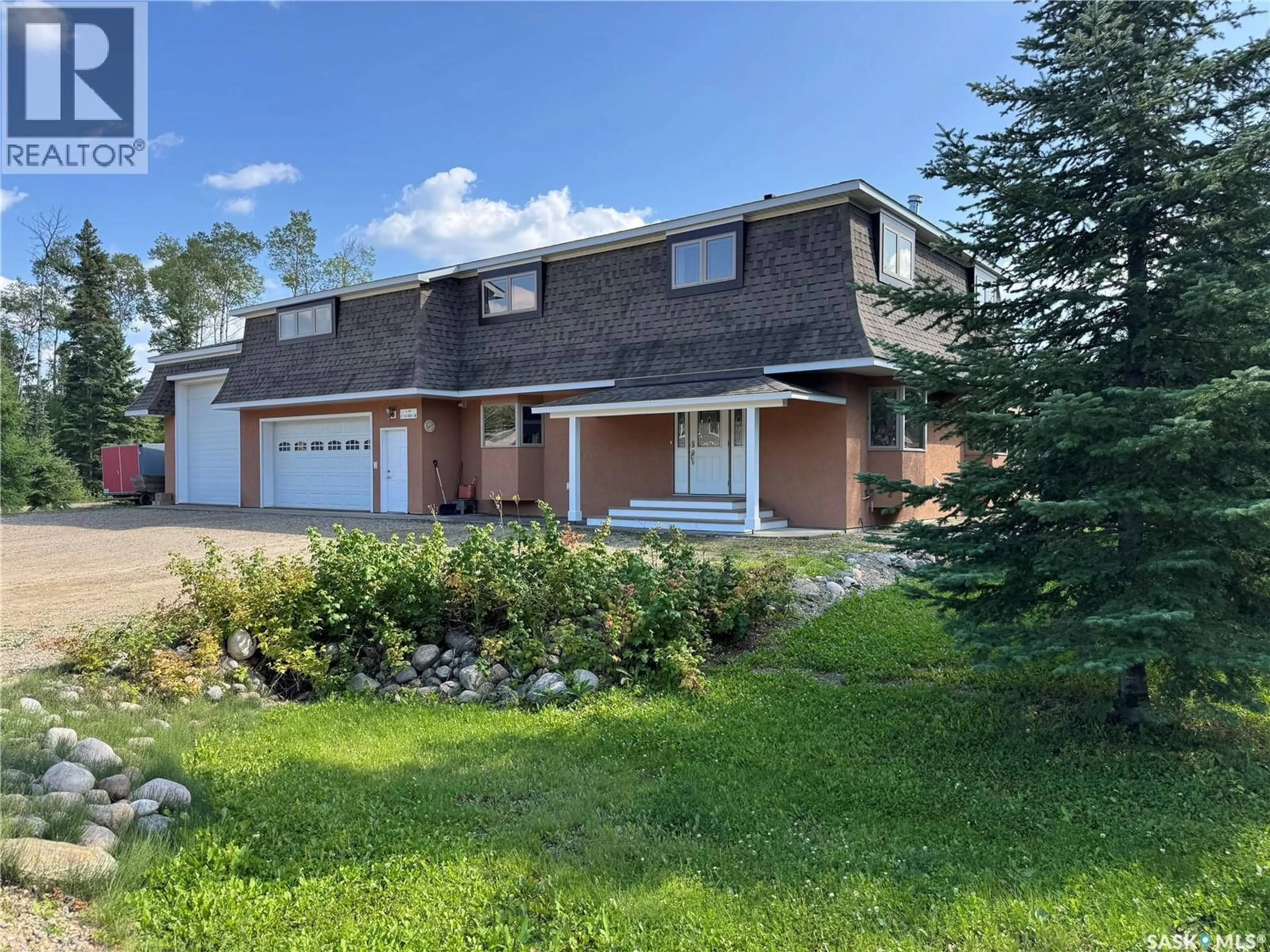 A pic from outside/outdoor area/front of a property/back of a property/a pic from drone, unknown for 21 FAIRWAY DRIVE, Candle Lake Saskatchewan S0J3E0