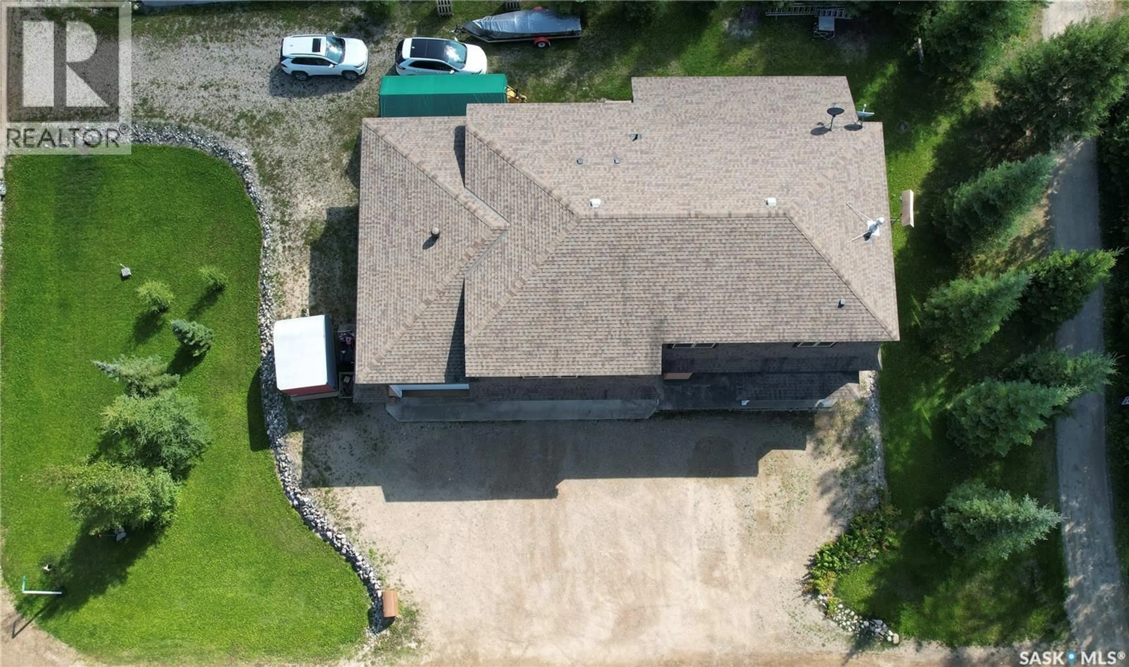 A pic from outside/outdoor area/front of a property/back of a property/a pic from drone, building for 21 FAIRWAY DRIVE, Candle Lake Saskatchewan S0J3E0