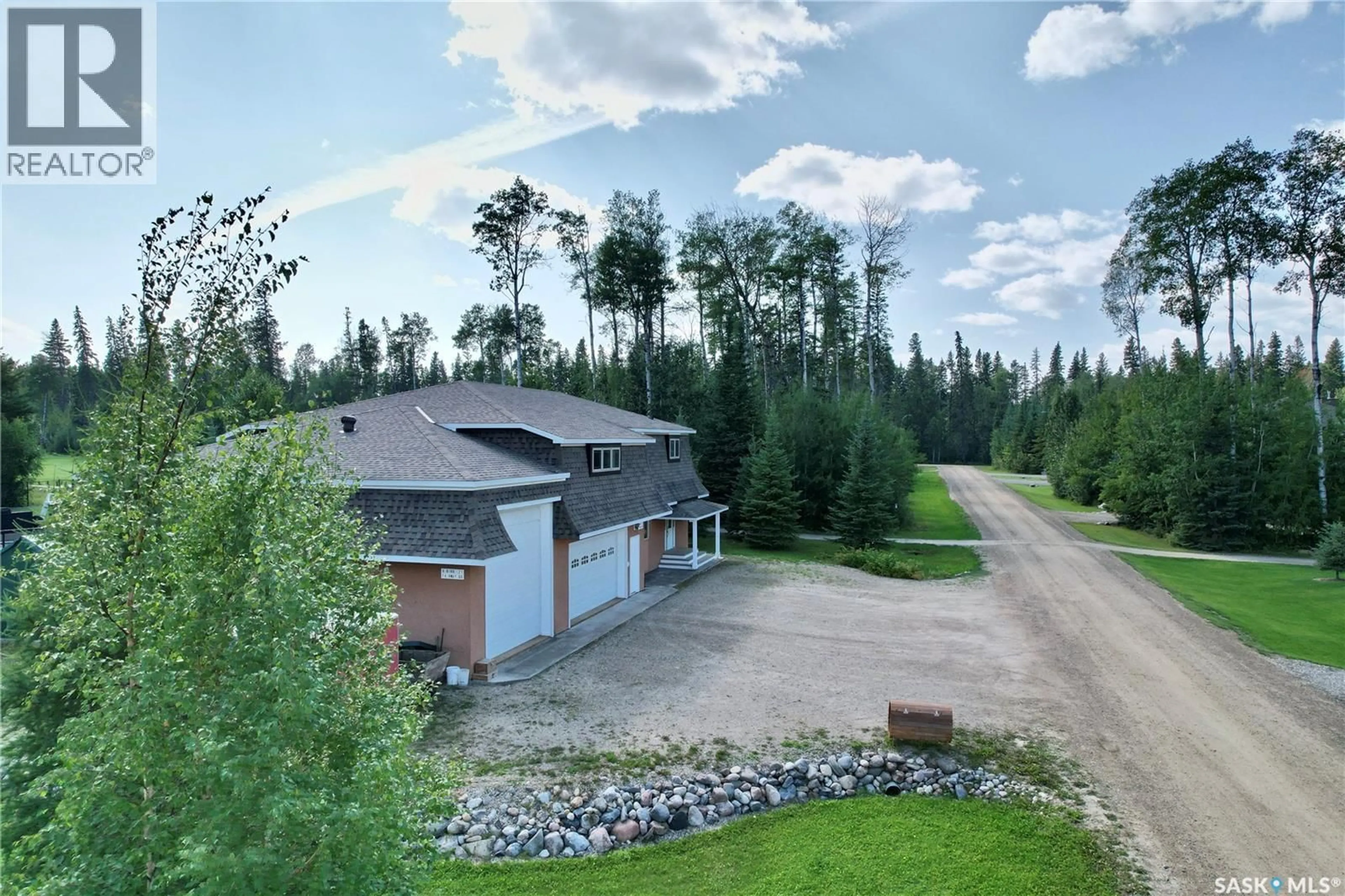 A pic from outside/outdoor area/front of a property/back of a property/a pic from drone, unknown for 21 FAIRWAY DRIVE, Candle Lake Saskatchewan S0J3E0