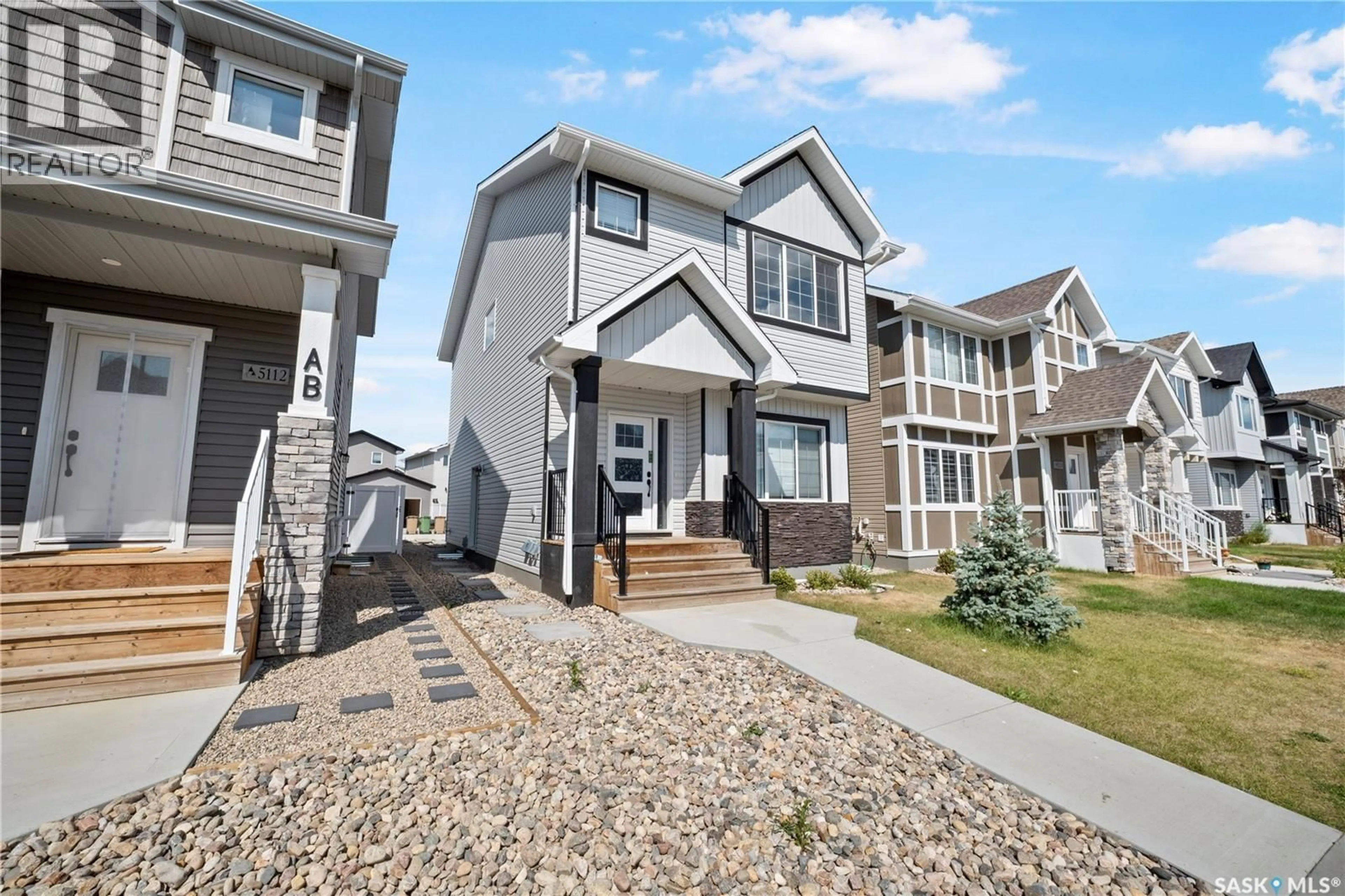 Home with vinyl exterior material, street for 5116 SIMARD AVENUE, Regina Saskatchewan S4V3W5