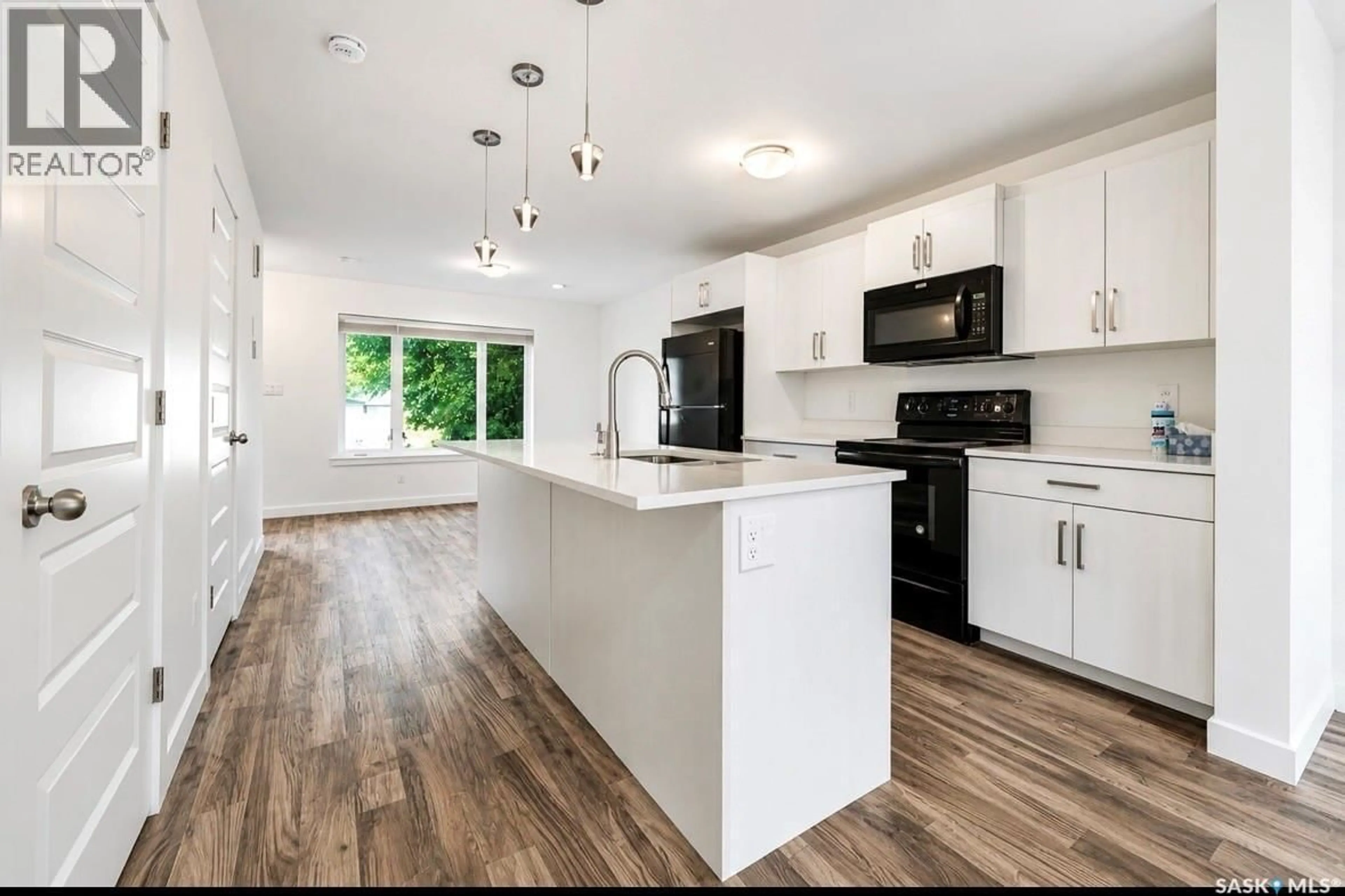 Open concept kitchen, unknown for 2464 FRANCIS STREET, Regina Saskatchewan S4N2P9