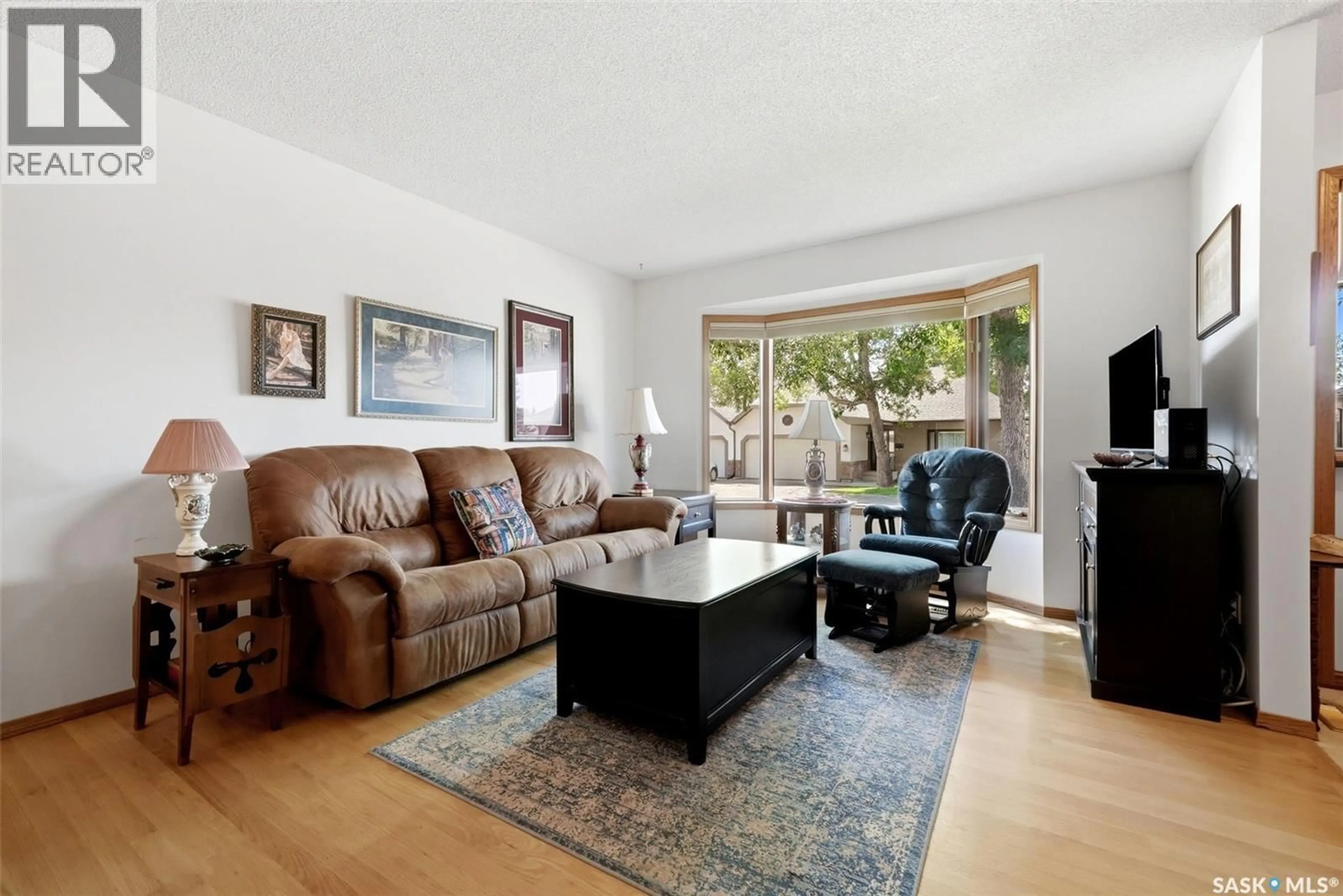 Living room with furniture, unknown for 3309 BROOKSHIRE LANE, Regina Saskatchewan S4V2R1