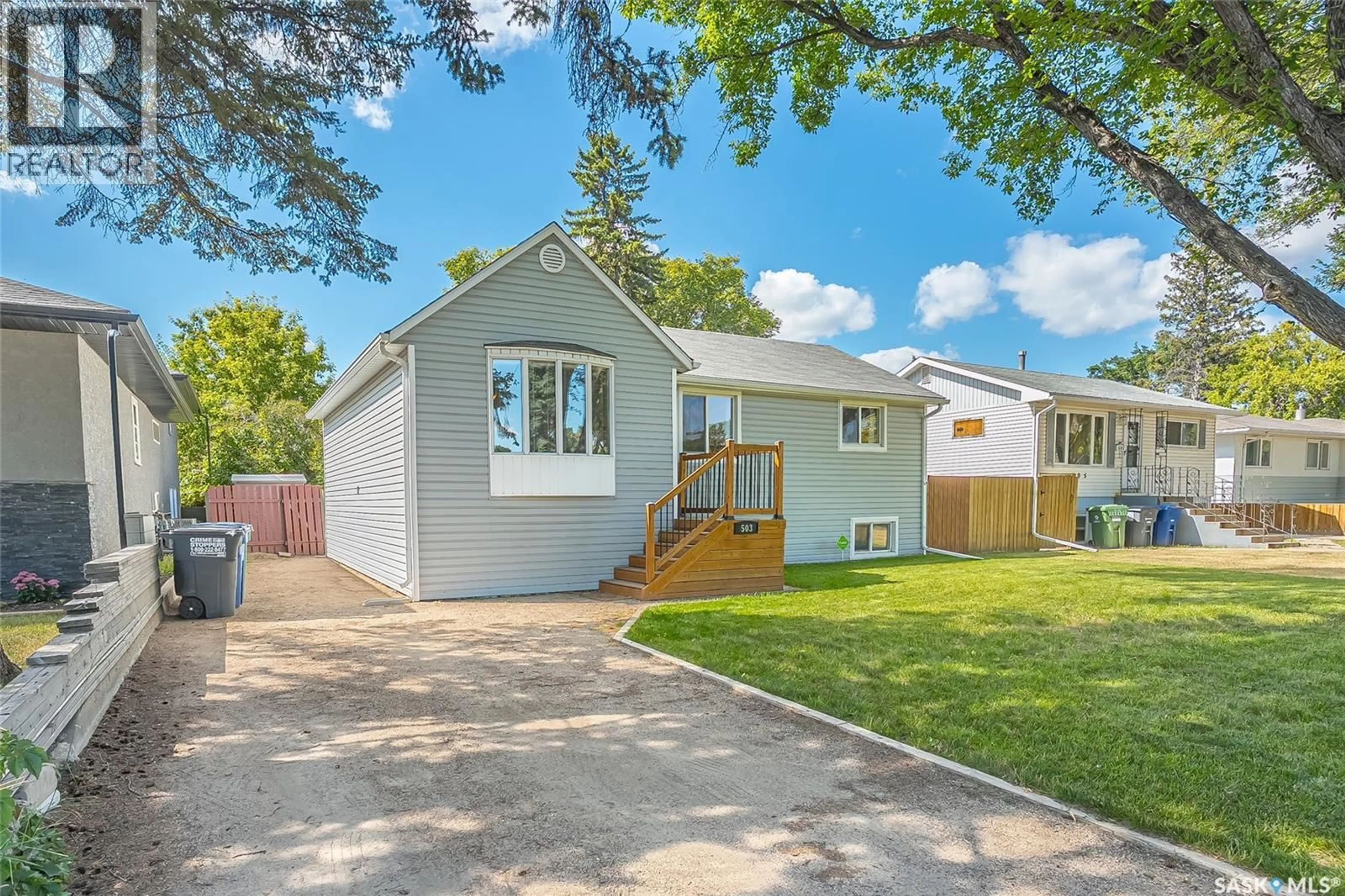 Home with vinyl exterior material, street for 503 P AVENUE, Saskatoon Saskatchewan S7L2W1