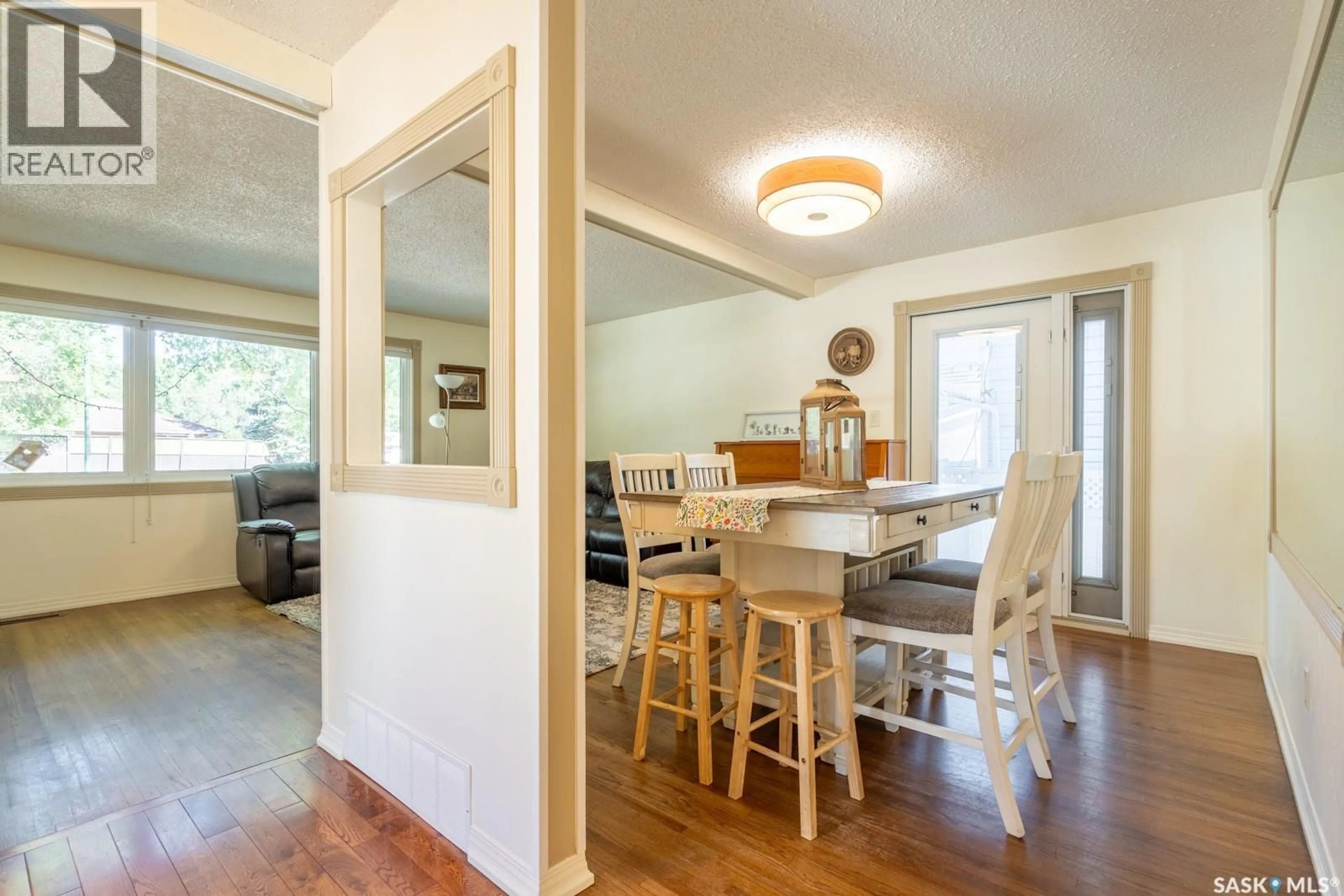 Dining room, wood/laminate floor for 24 MAYFAIR CRESCENT, Regina Saskatchewan S4S4H5