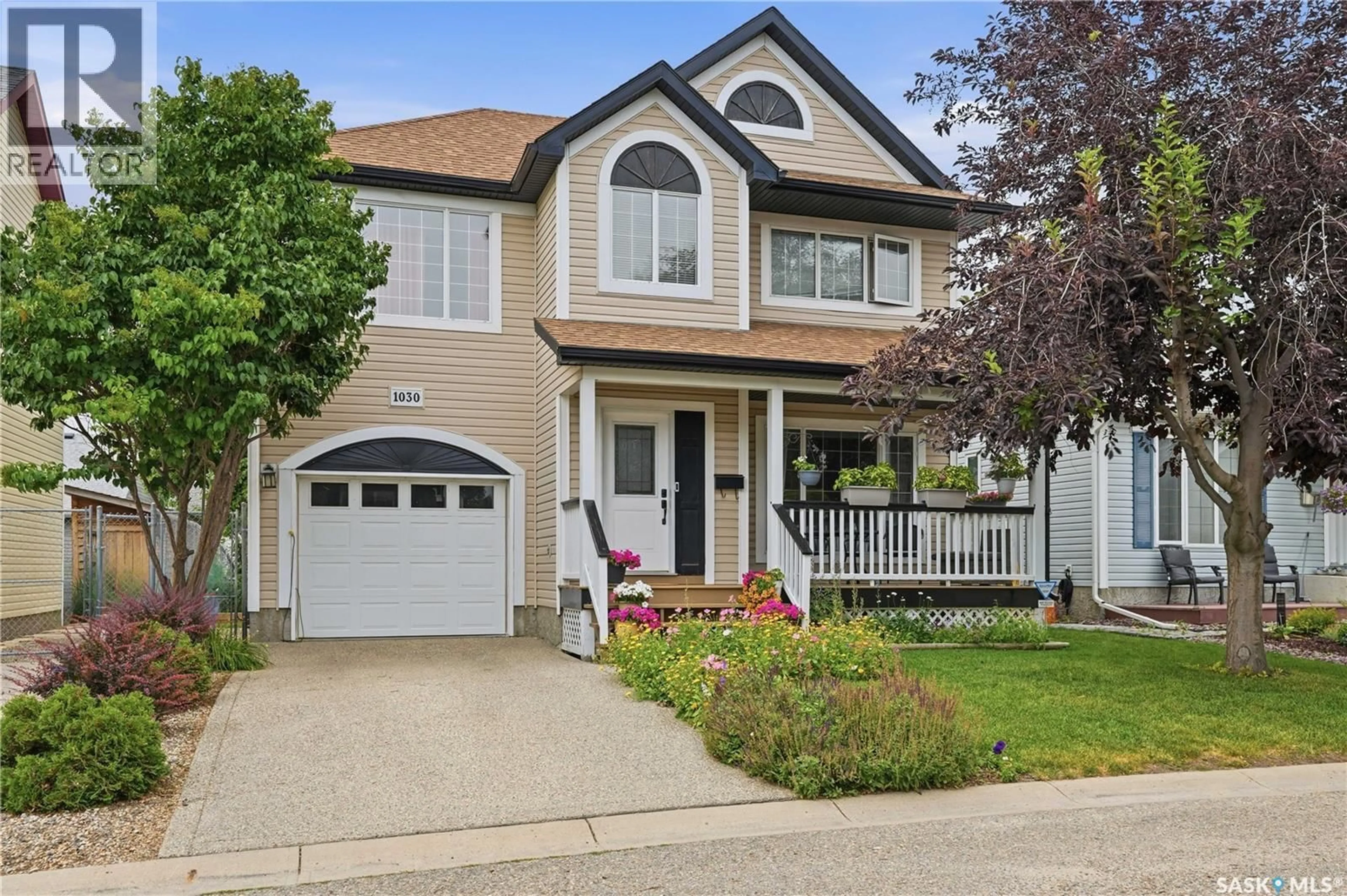 Home with vinyl exterior material, street for 1030 ORCHID WAY, Regina Saskatchewan S4X4R4