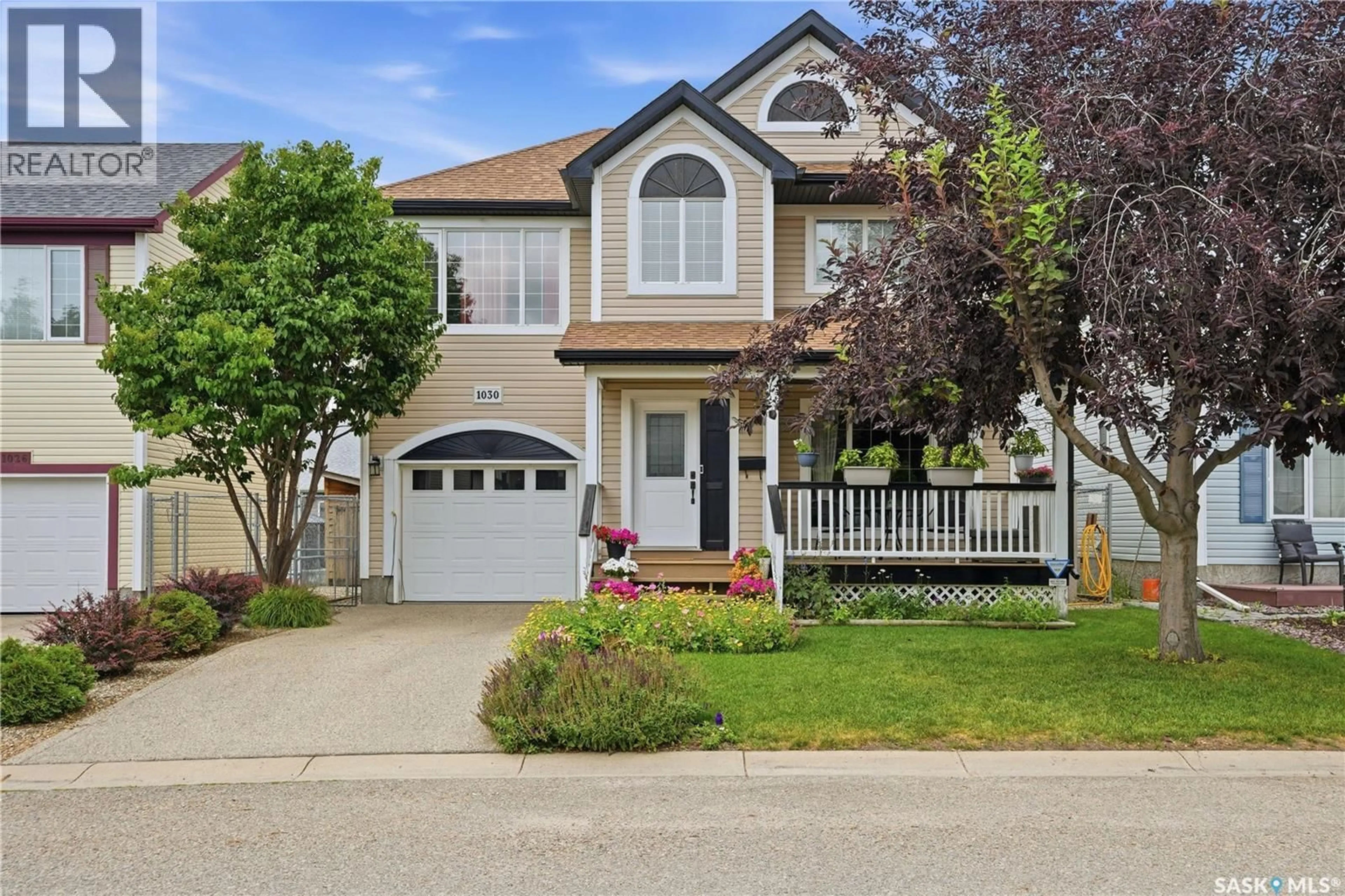 Home with vinyl exterior material, street for 1030 ORCHID WAY, Regina Saskatchewan S4X4R4