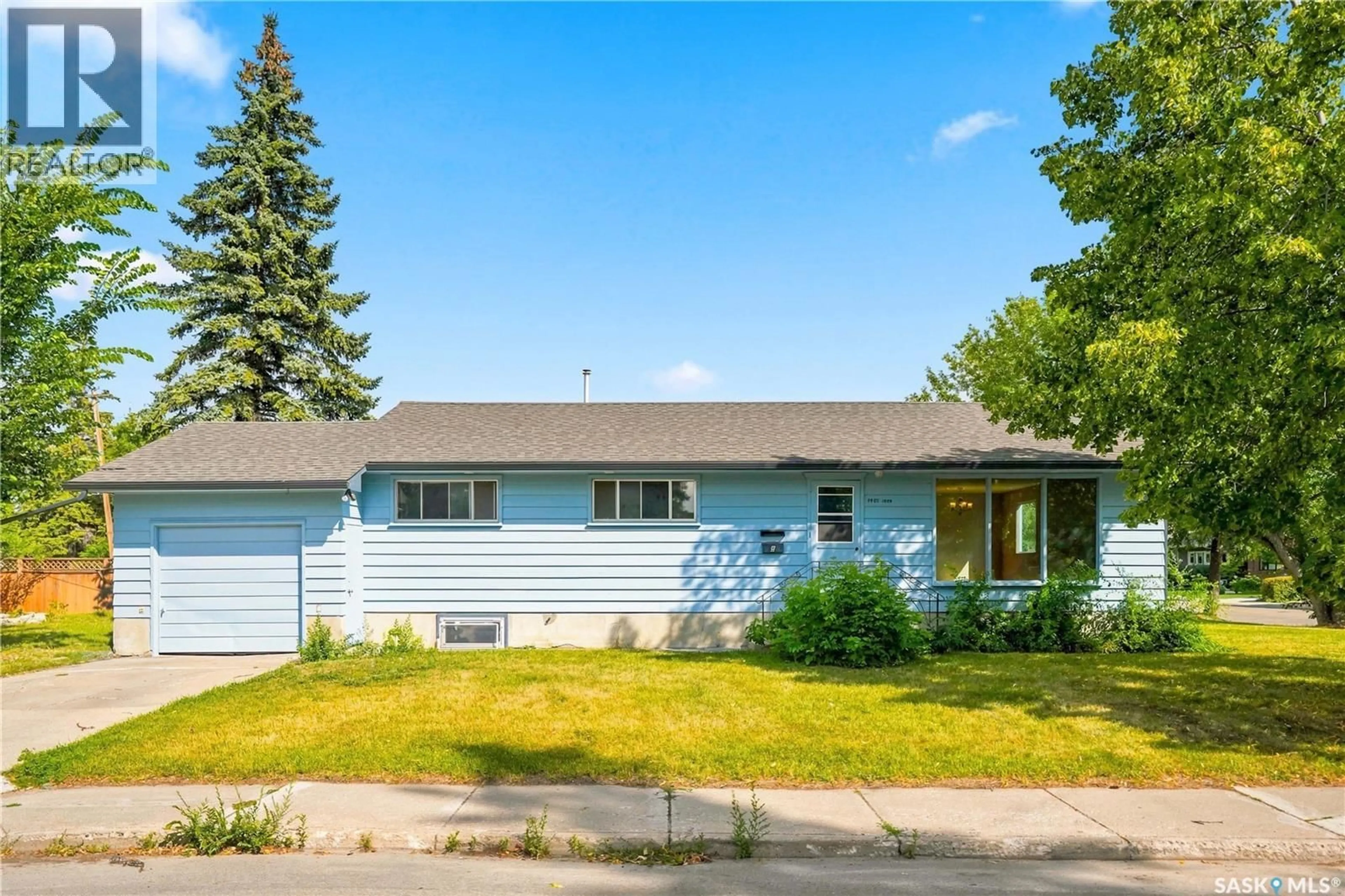Home with vinyl exterior material, street for 1401 10TH STREET, Saskatoon Saskatchewan S7H0J4