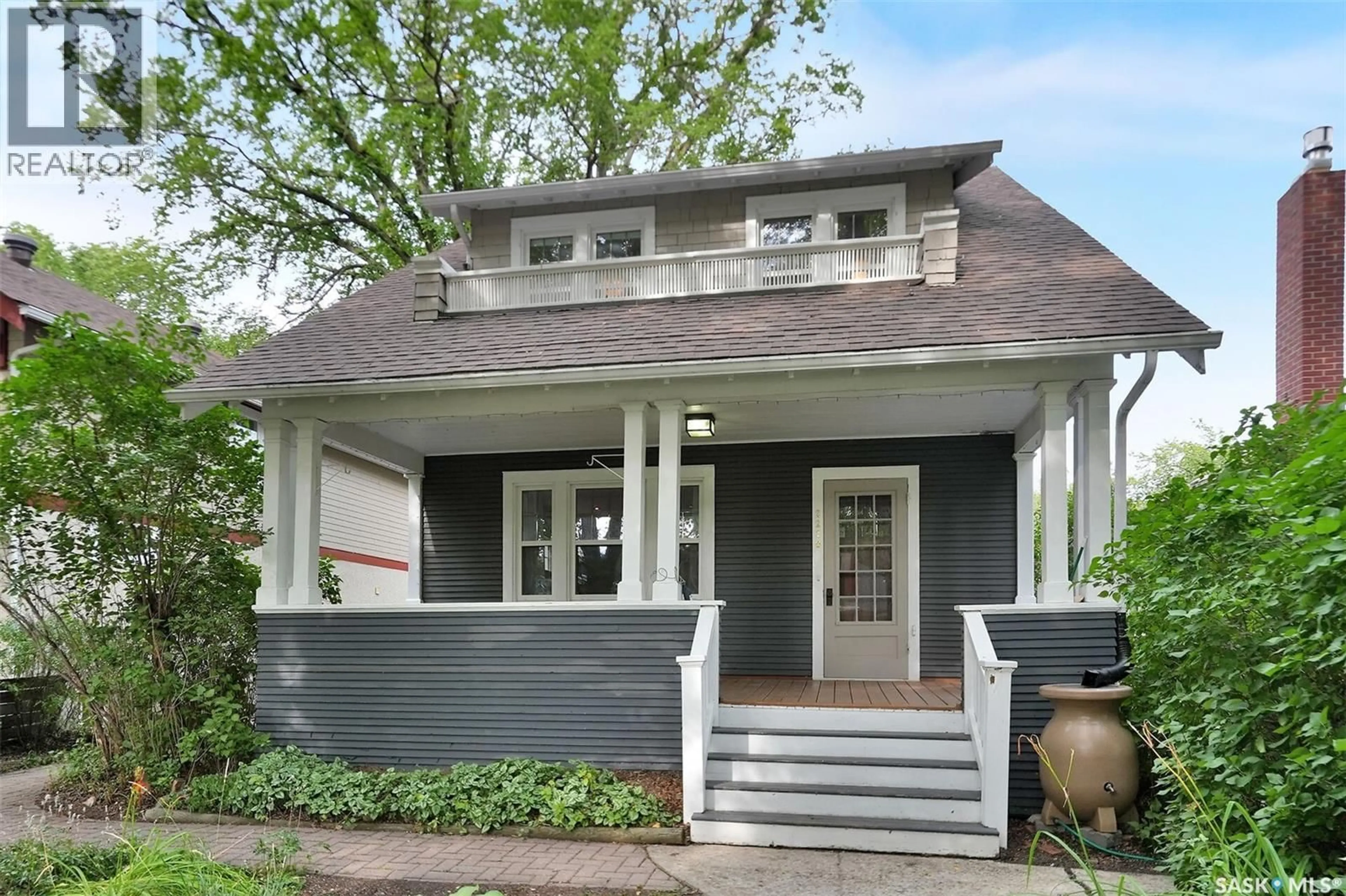 Home with vinyl exterior material, street for 2210 ATHOL STREET, Regina Saskatchewan S4T3E9