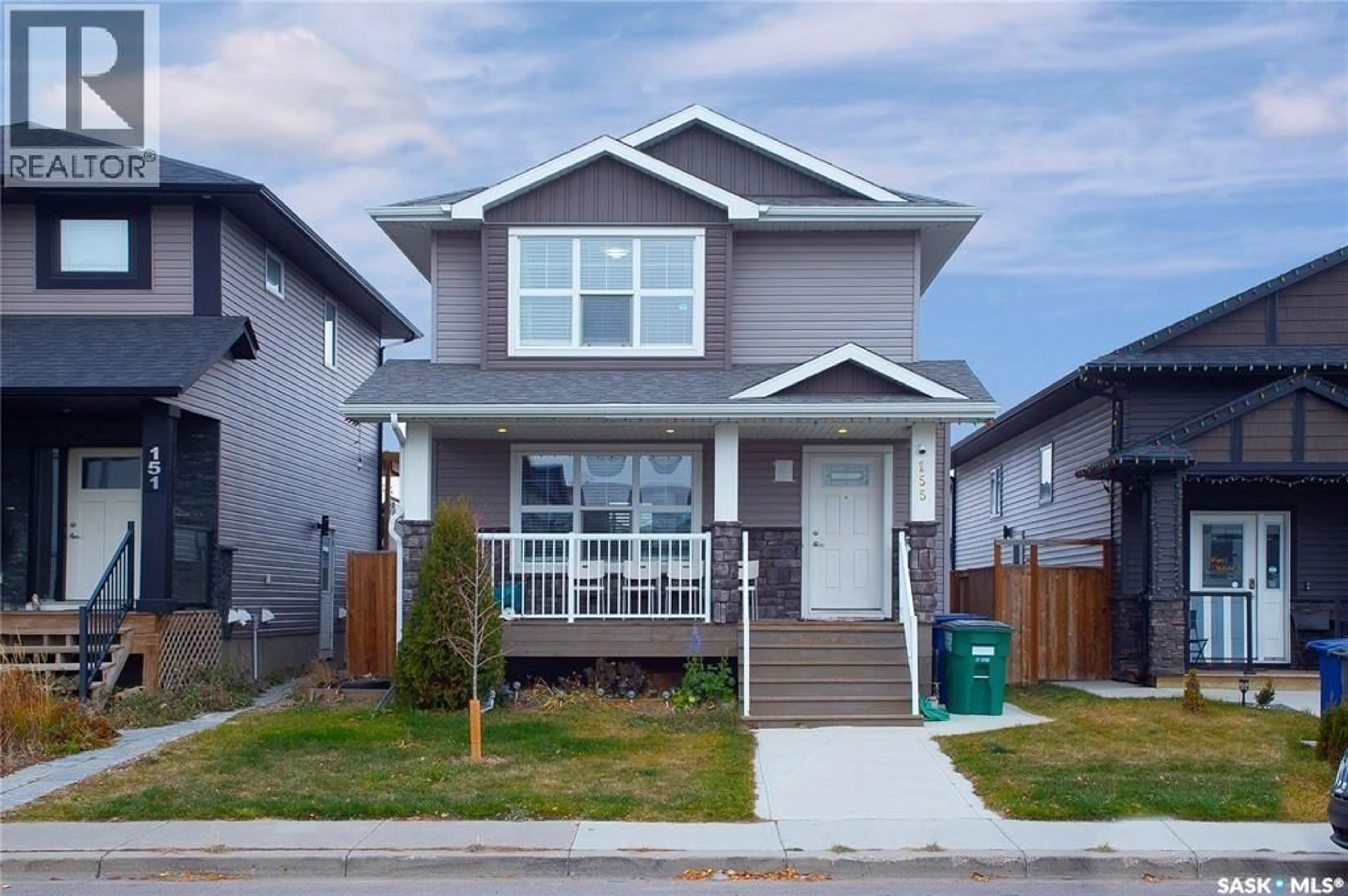 Home with vinyl exterior material, street for 155 MARLATTE CRESCENT, Saskatoon Saskatchewan S7W0T1