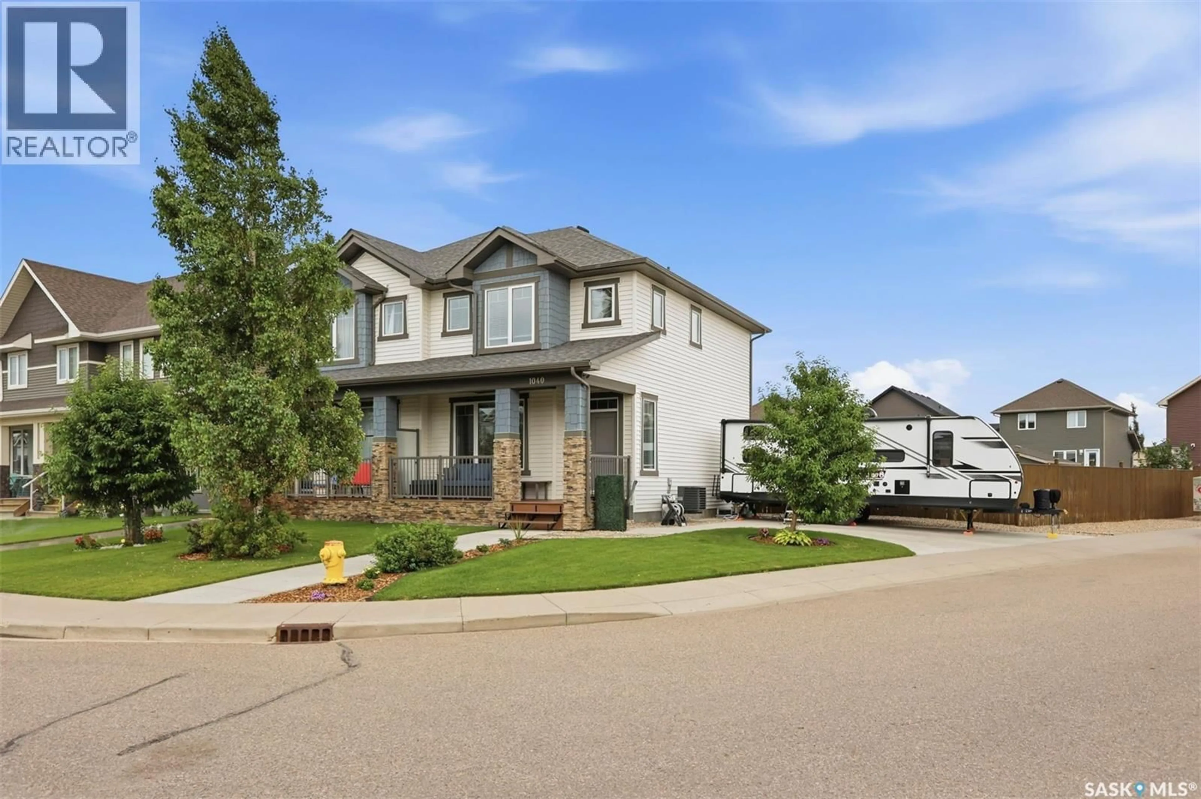 Home with brick exterior material, street for 1040 KOLYNCHUK CRESCENT, Saskatoon Saskatchewan S7T0X4