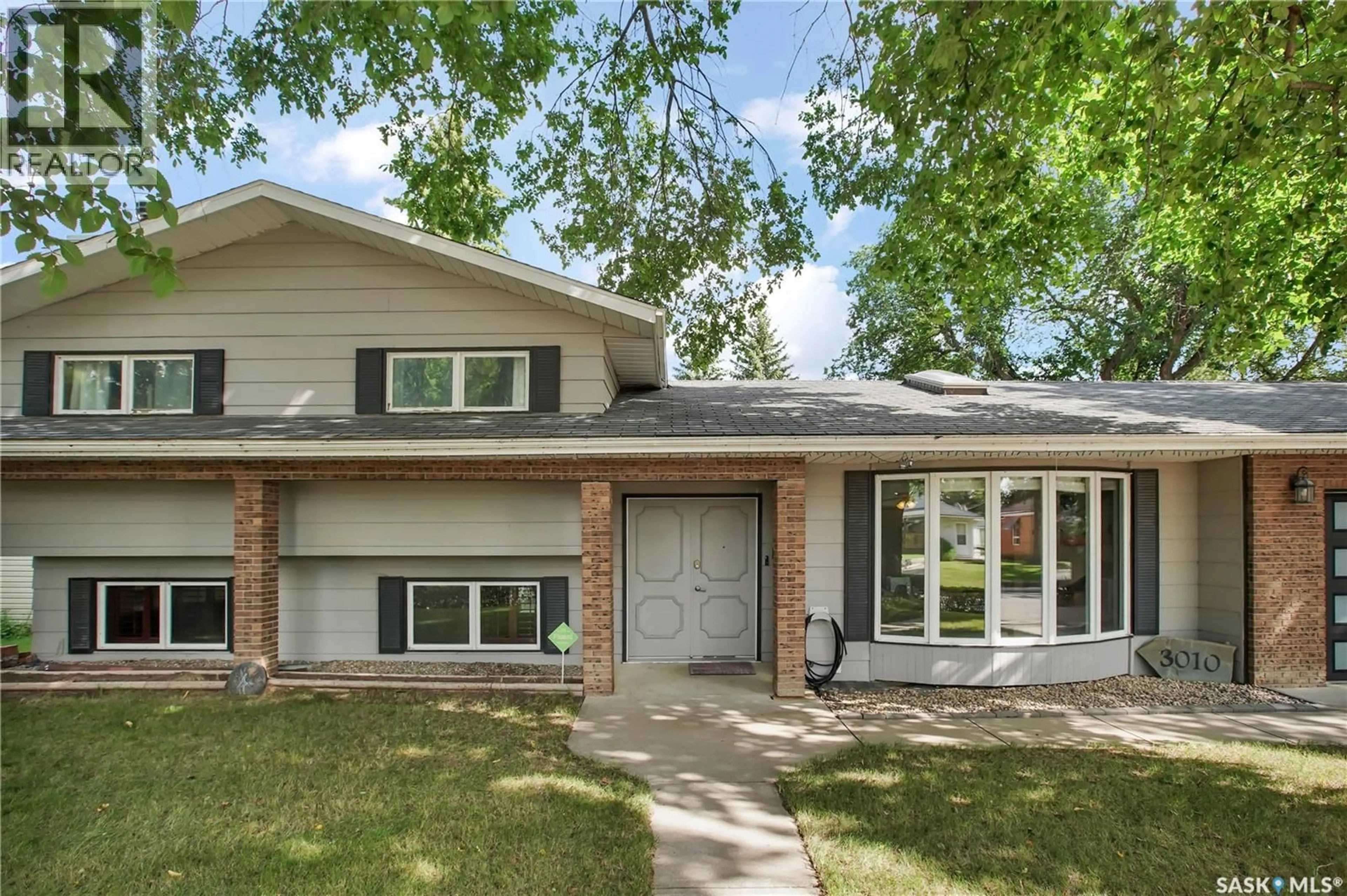 Home with brick exterior material, street for 3010 5TH STREET, Rosthern Saskatchewan S0K3R0