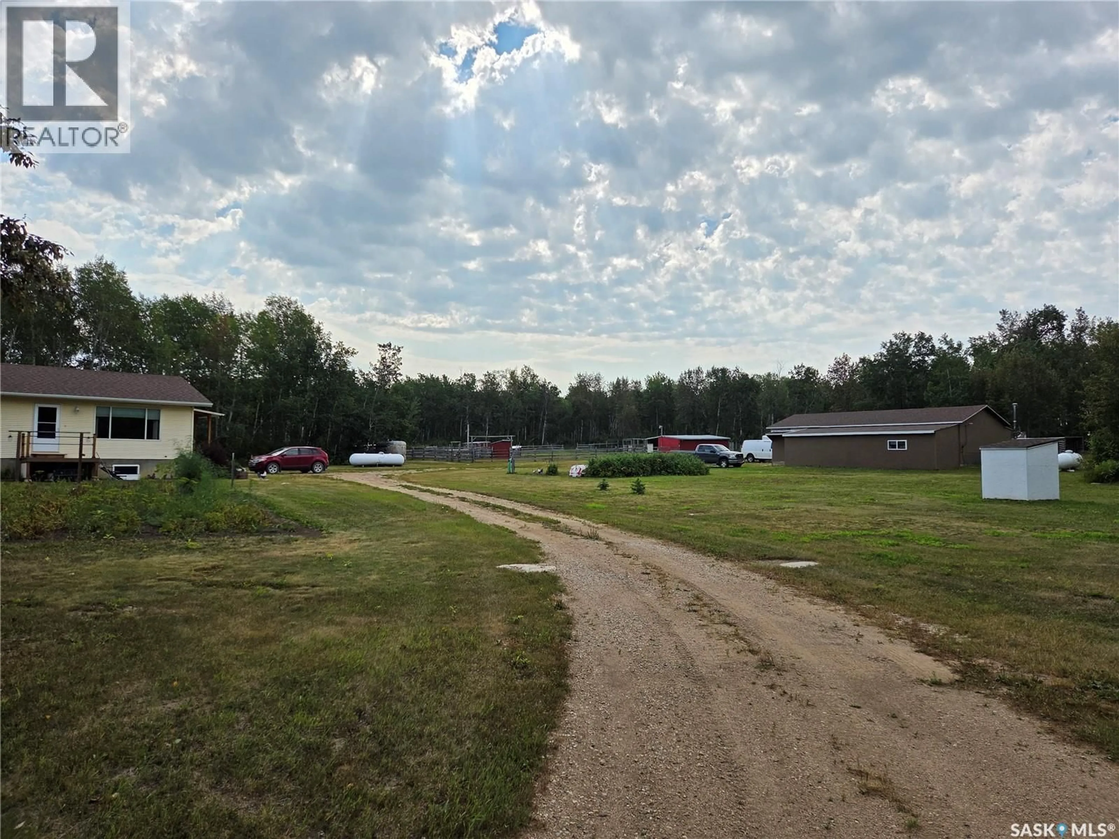 A pic from outside/outdoor area/front of a property/back of a property/a pic from drone, street for REINE ACREAGE, Tisdale Rm No. 427 Saskatchewan S0E1T0
