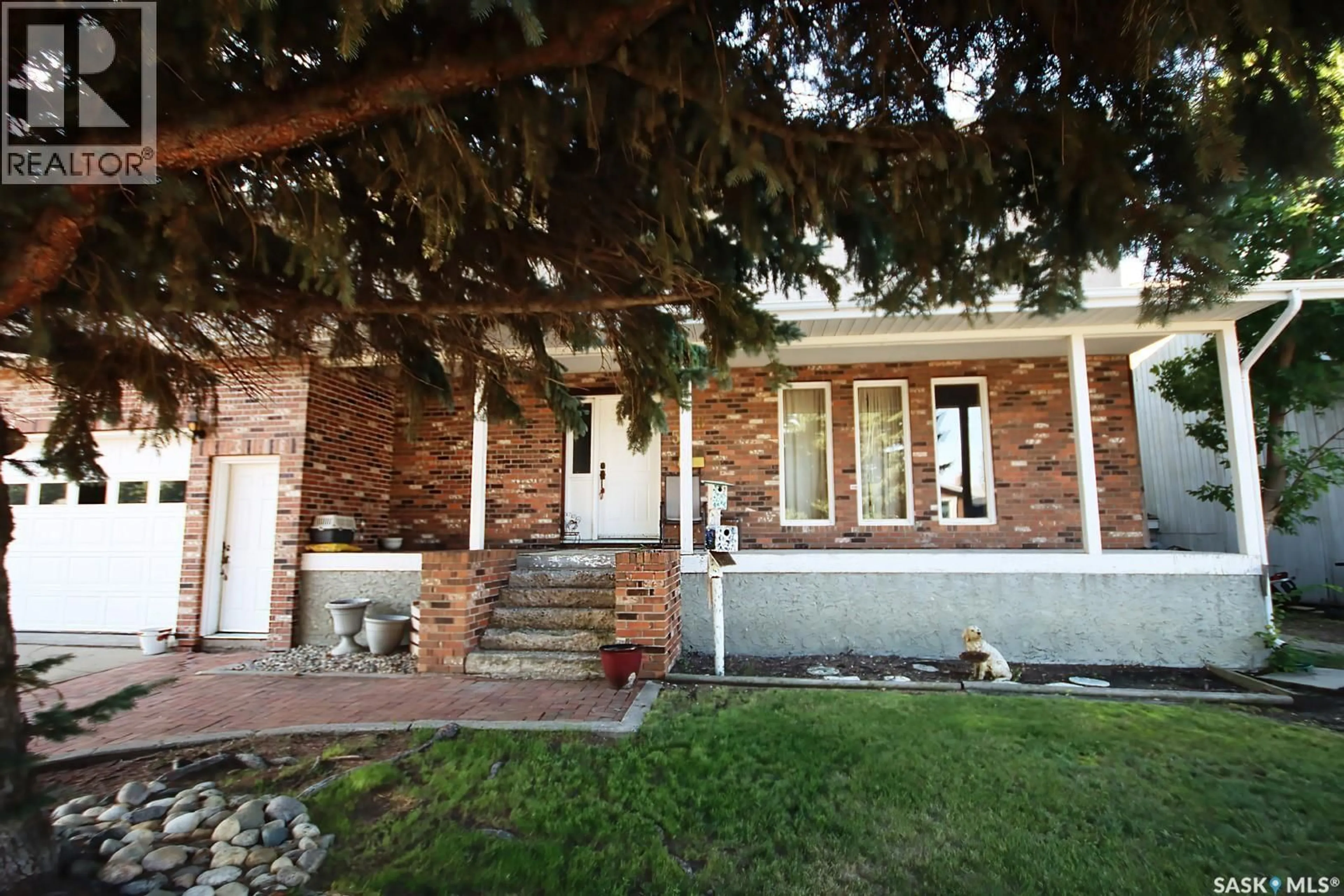 Home with brick exterior material, street for 506 GARRISH PLACE, Estevan Saskatchewan S4A2E5