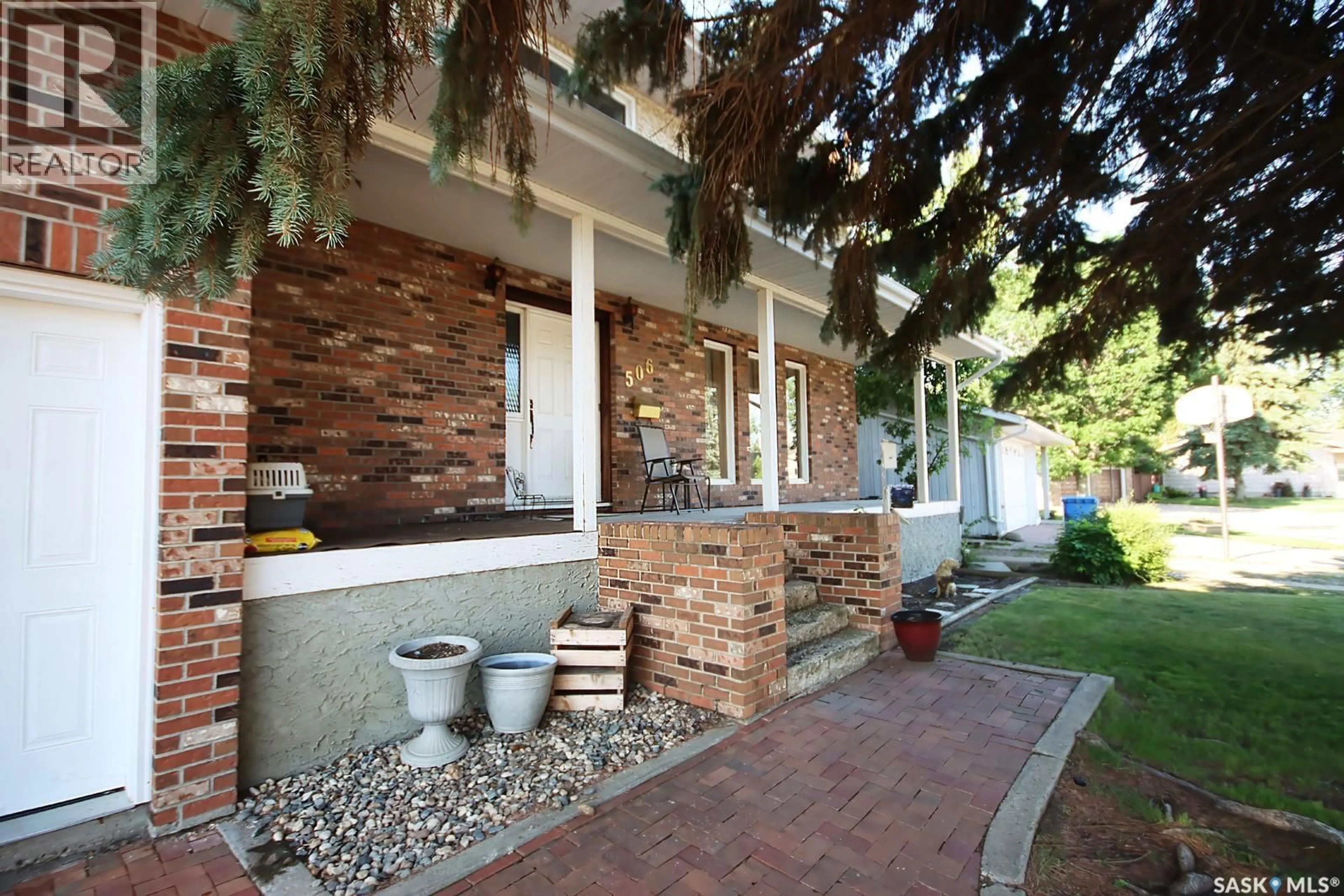 Home with brick exterior material, street for 506 GARRISH PLACE, Estevan Saskatchewan S4A2E5