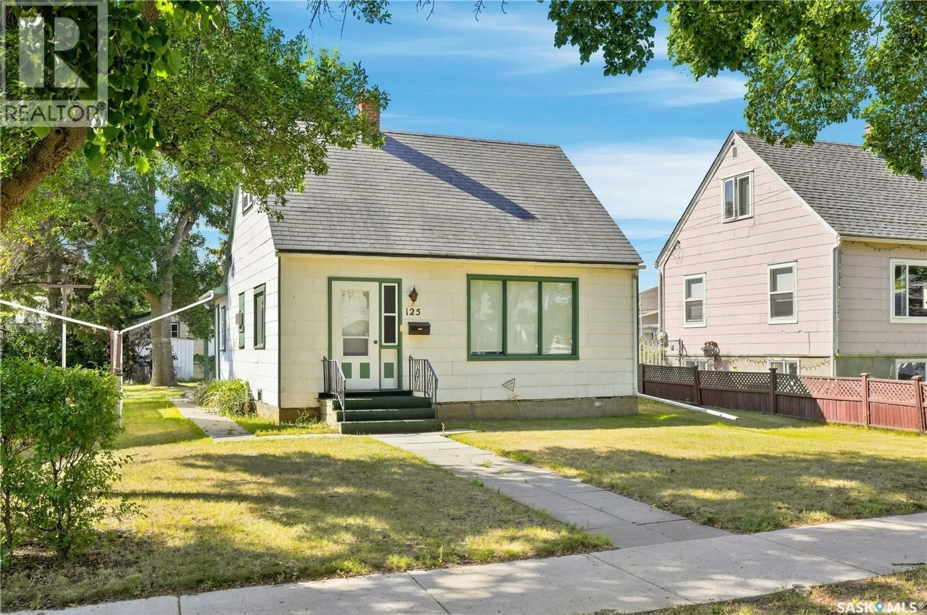 Home with vinyl exterior material, street for 125 111TH STREET, Saskatoon Saskatchewan S7N1T1