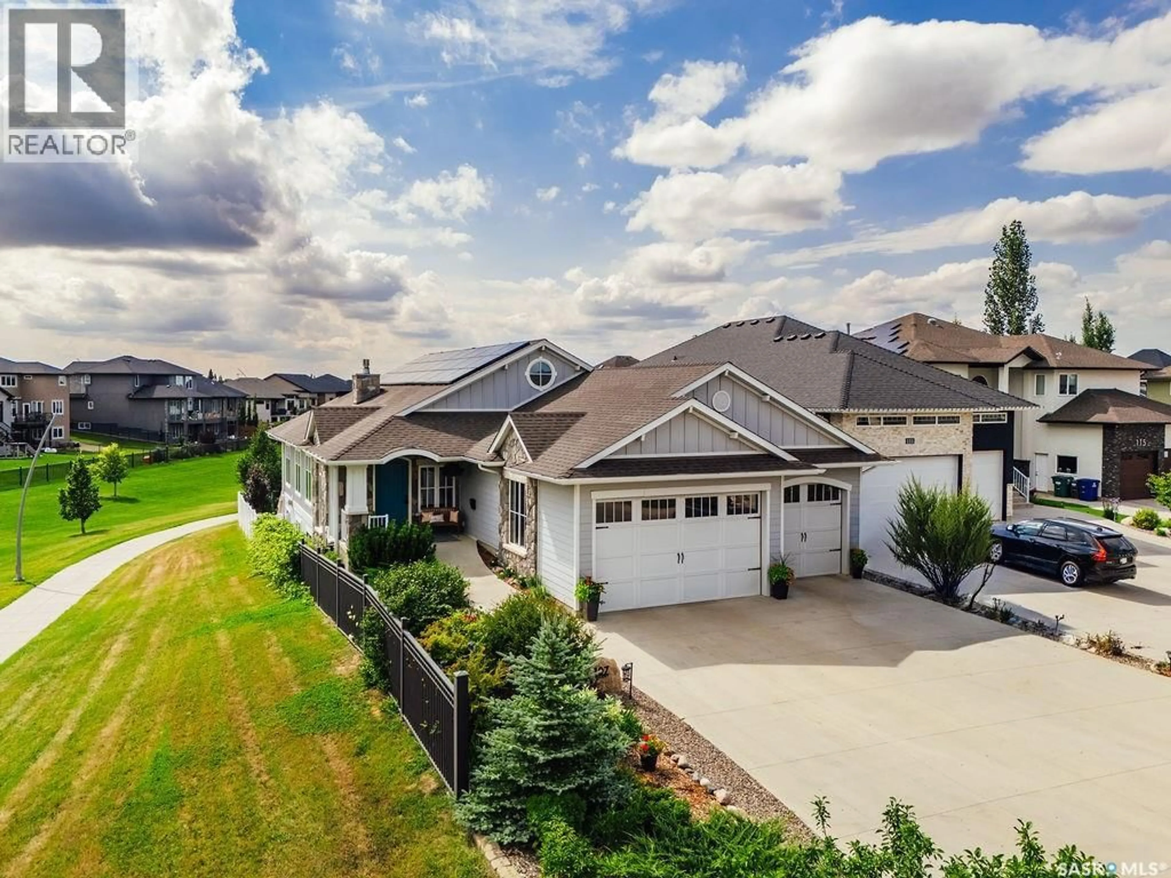 A pic from outside/outdoor area/front of a property/back of a property/a pic from drone, street for 107 MAHABIR CRESCENT, Saskatoon Saskatchewan S7S1L9