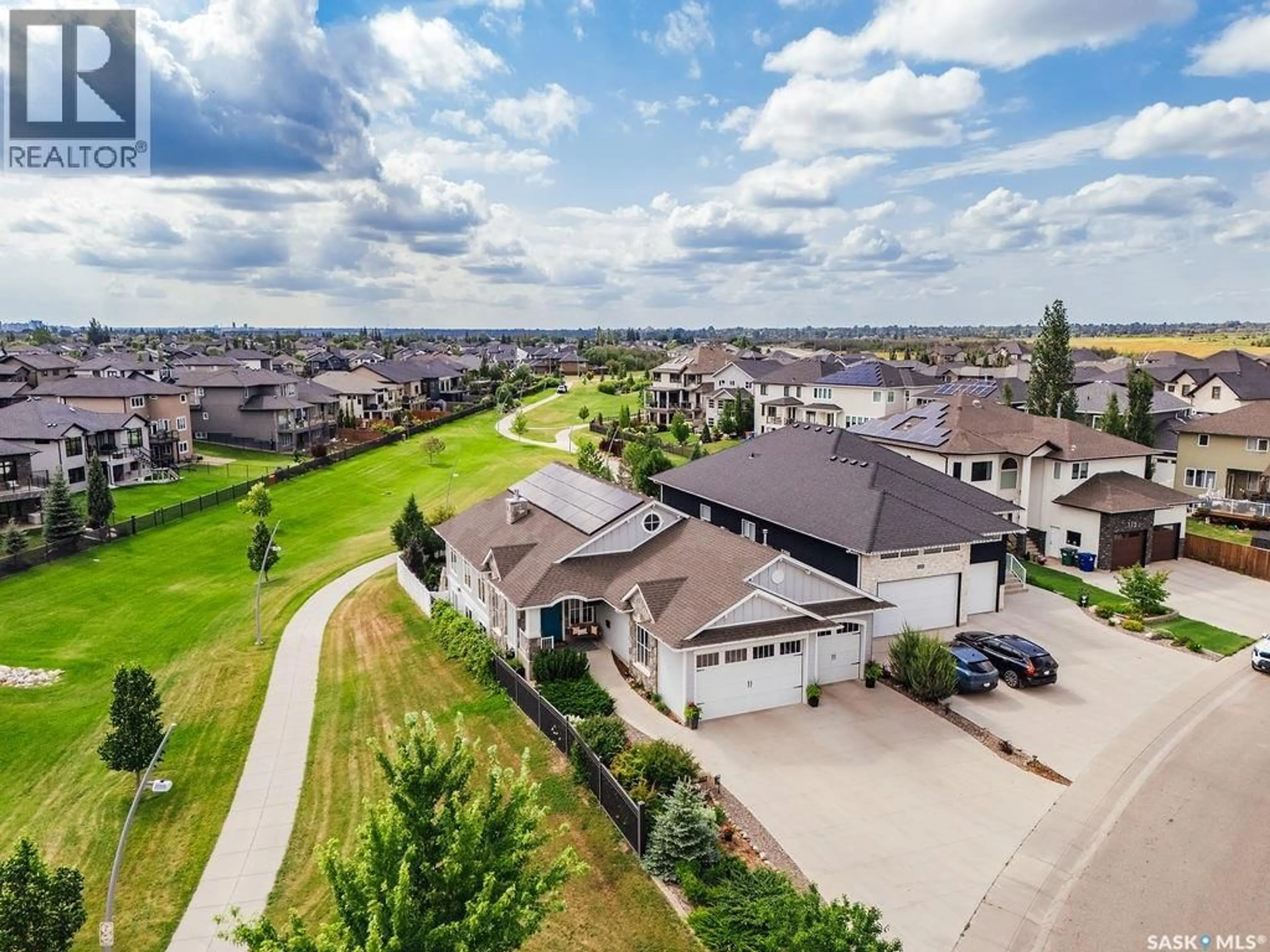 A pic from outside/outdoor area/front of a property/back of a property/a pic from drone, street for 107 MAHABIR CRESCENT, Saskatoon Saskatchewan S7S1L9