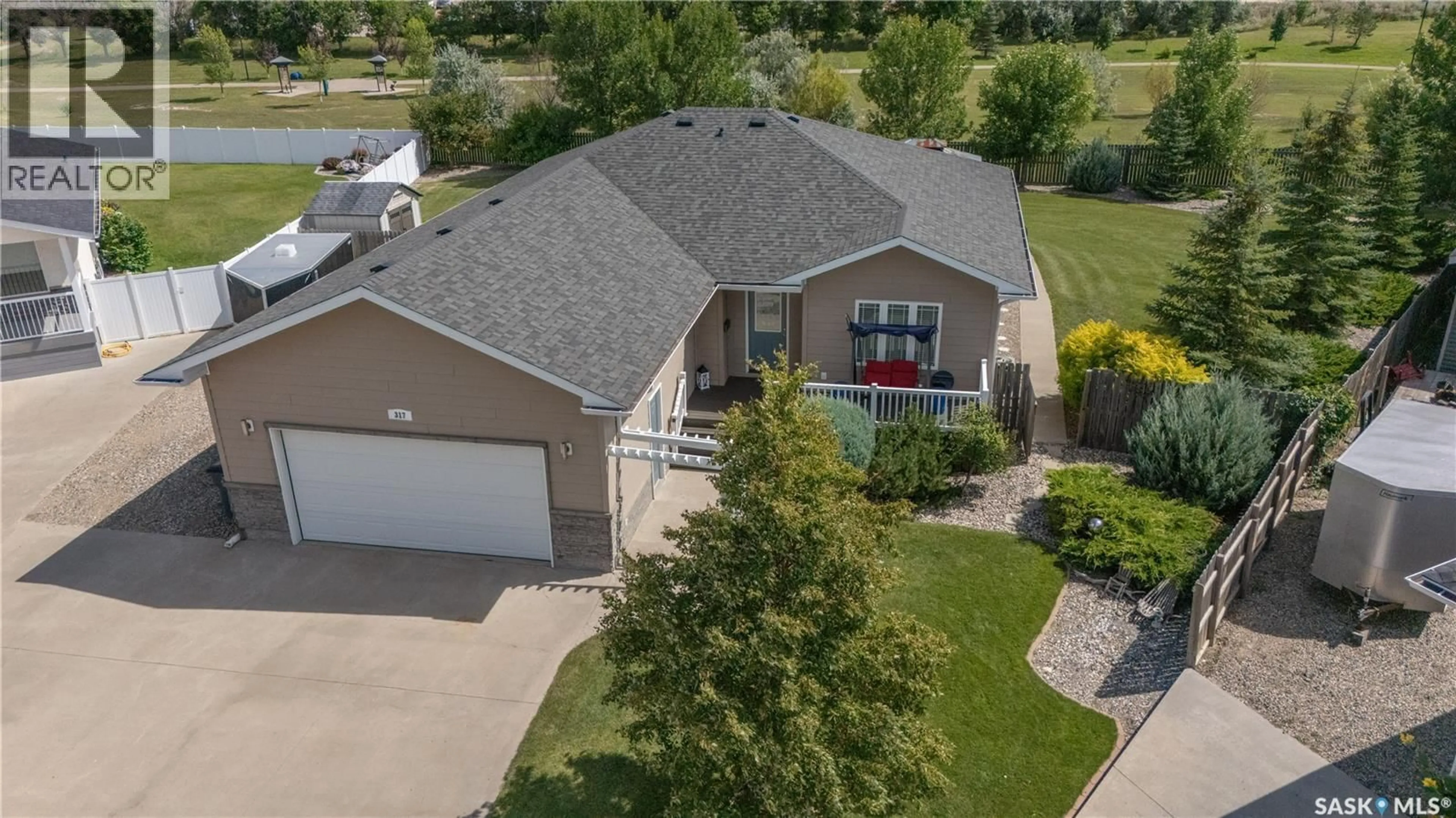 A pic from outside/outdoor area/front of a property/back of a property/a pic from drone, street for 317 FREHLICK BAY, Estevan Saskatchewan S4A0Y1