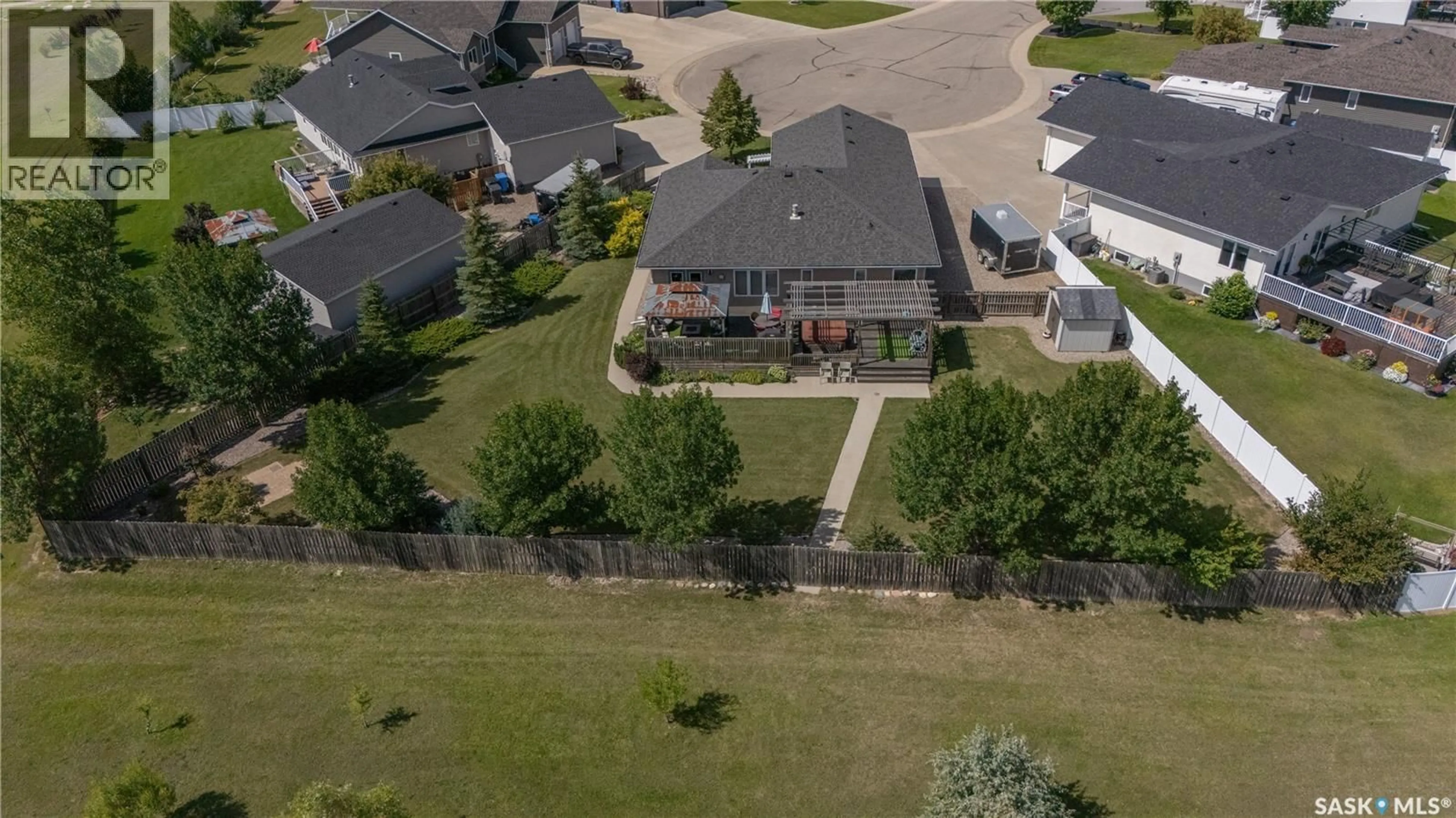 A pic from outside/outdoor area/front of a property/back of a property/a pic from drone, street for 317 FREHLICK BAY, Estevan Saskatchewan S4A0Y1