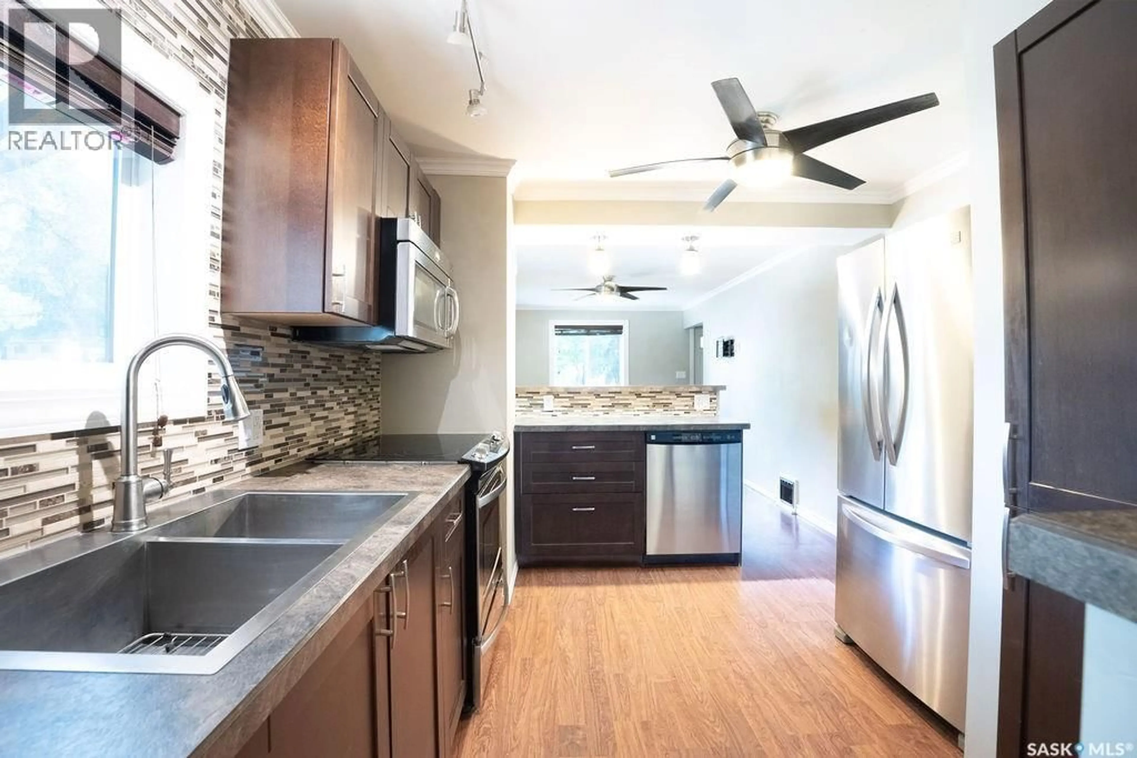 Open concept kitchen, unknown for 702 29TH STREET, Saskatoon Saskatchewan S7L0N1