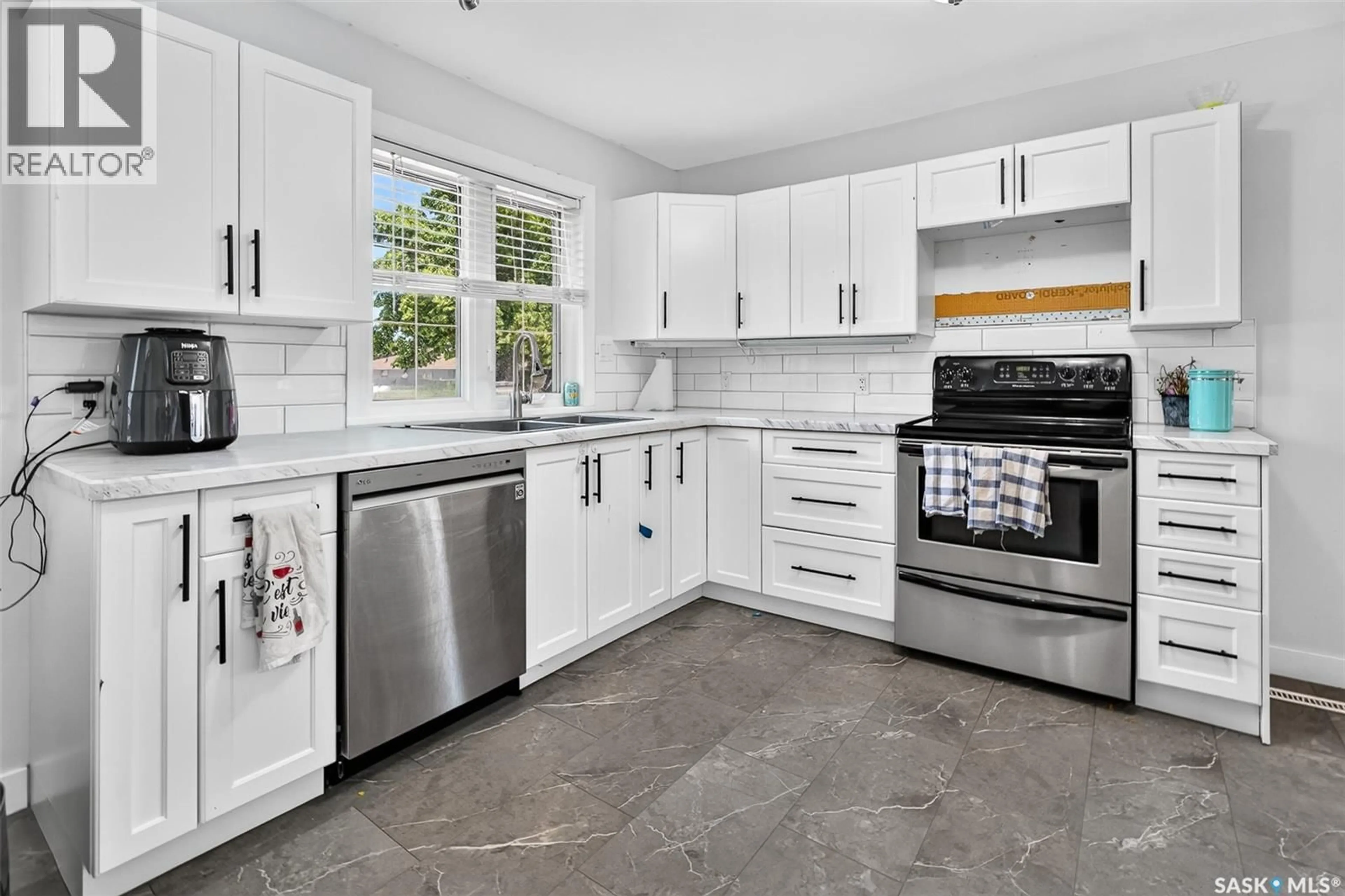 Open concept kitchen, ceramic/tile floor for 1249 GRACE STREET, Moose Jaw Saskatchewan S6H3C6