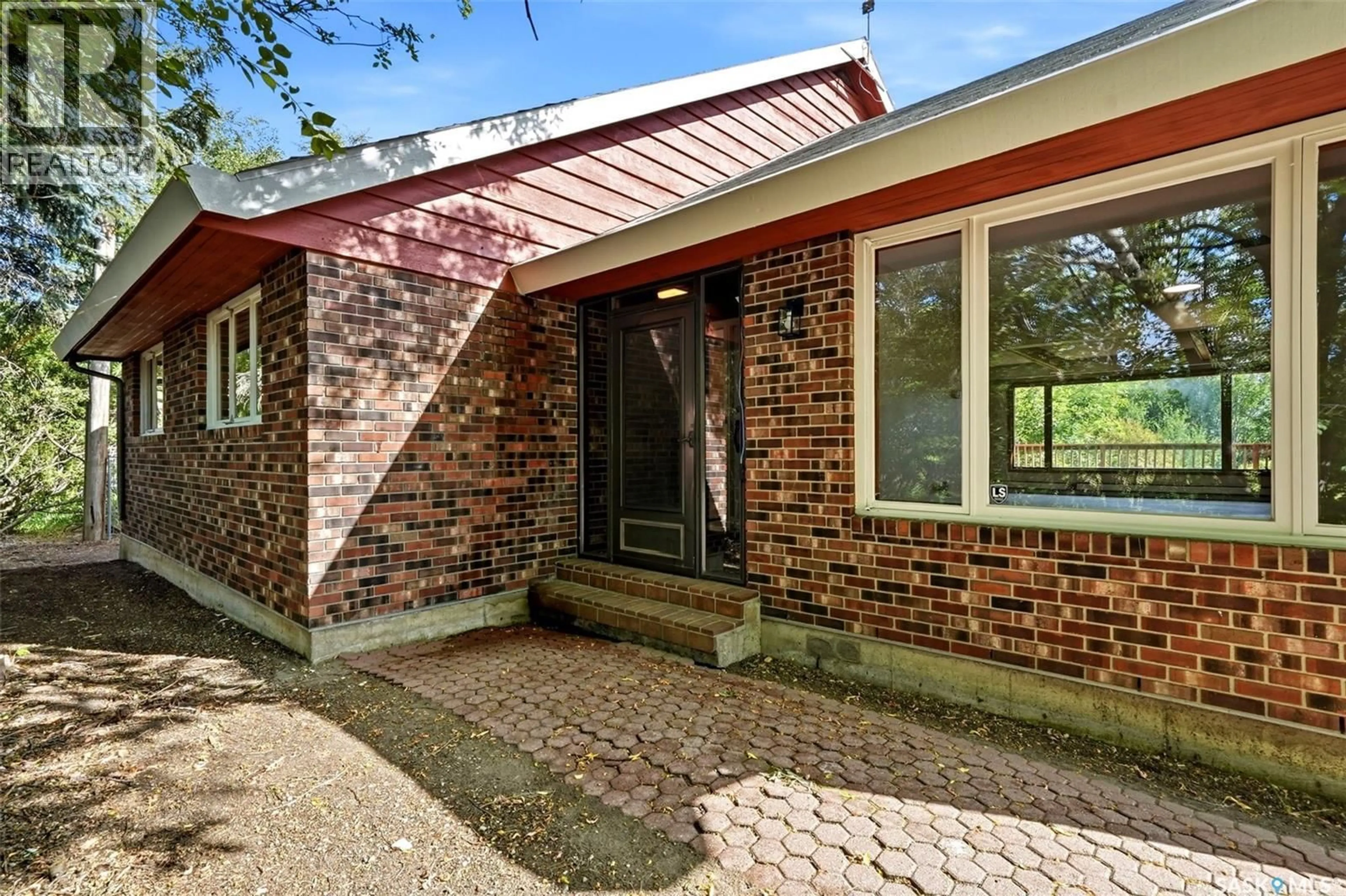 Home with brick exterior material, street for 316 3RD AVENUE, Edenwold Saskatchewan S0G1K0